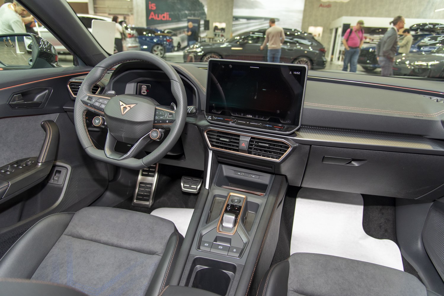 Modern car interior with digital instrument cluster and touchscreen infotainment
