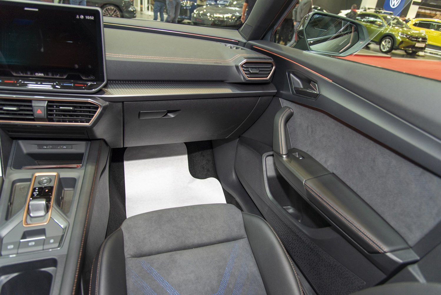 Modern car dashboard and door panel interior with infotainment screen