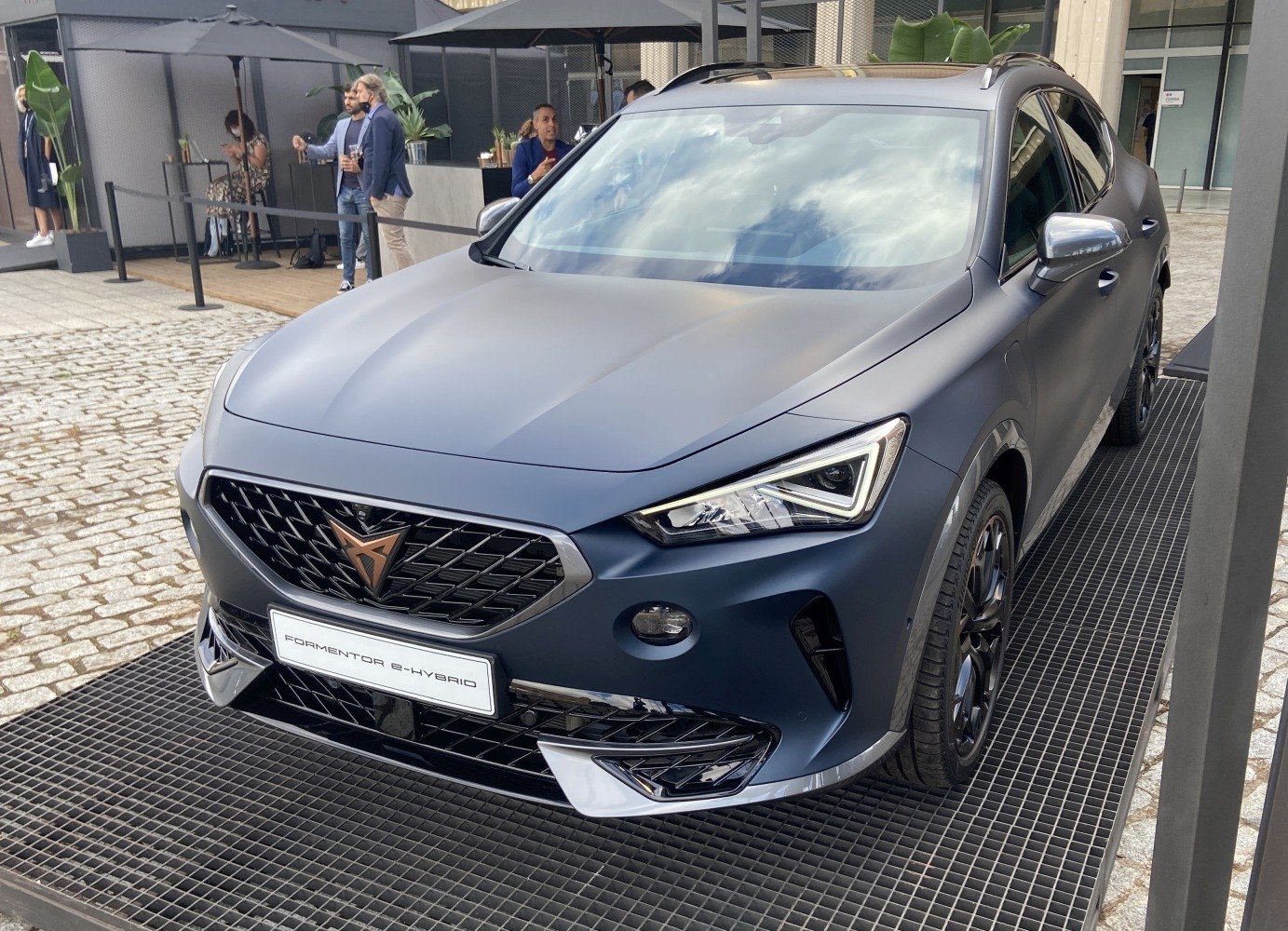 Front view showcasing LED headlights and a distinctive grille design.