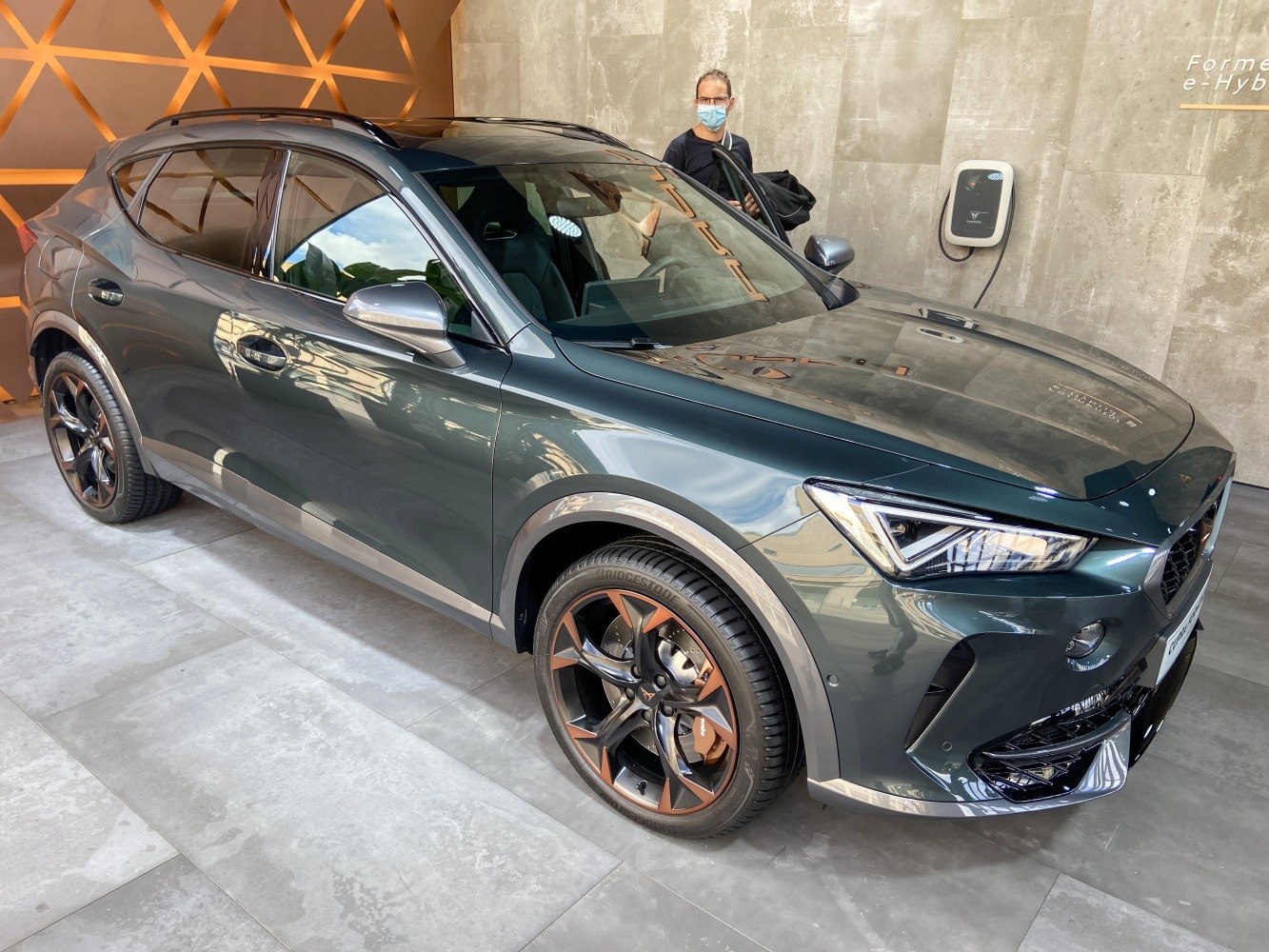 Front-side view of SUV with distinctive alloy wheels and LED headlights
