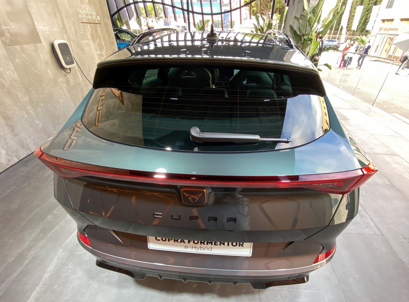 Rear view with continuous tail light and rear wiper