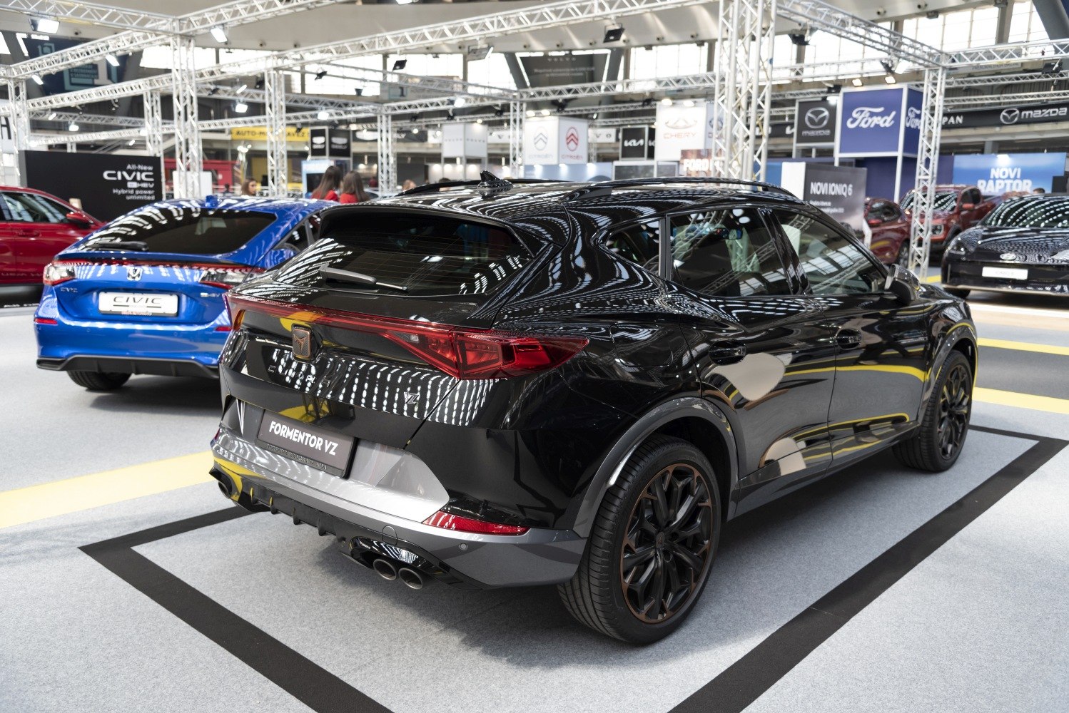 Sporty rear design with quad exhausts and aerodynamic lines