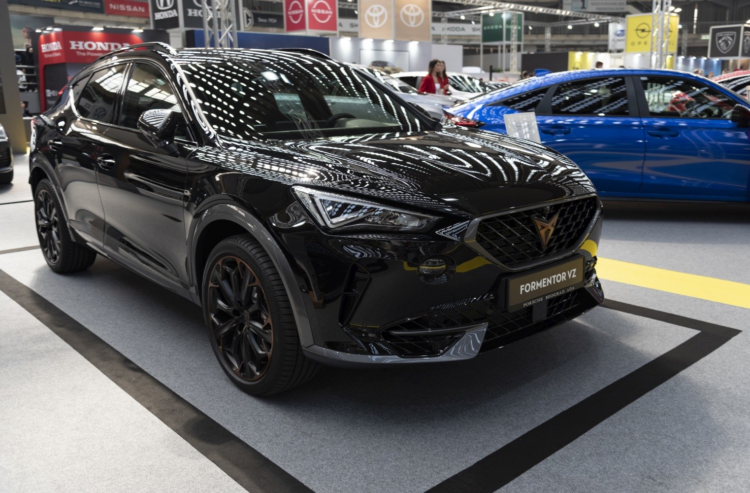 Sporty crossover SUV with LED headlights and bold grille.