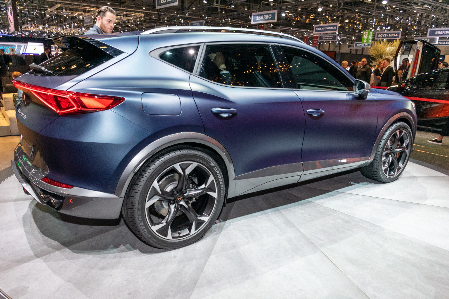 Rear side view of SUV with distinctive alloy wheels and sleek design