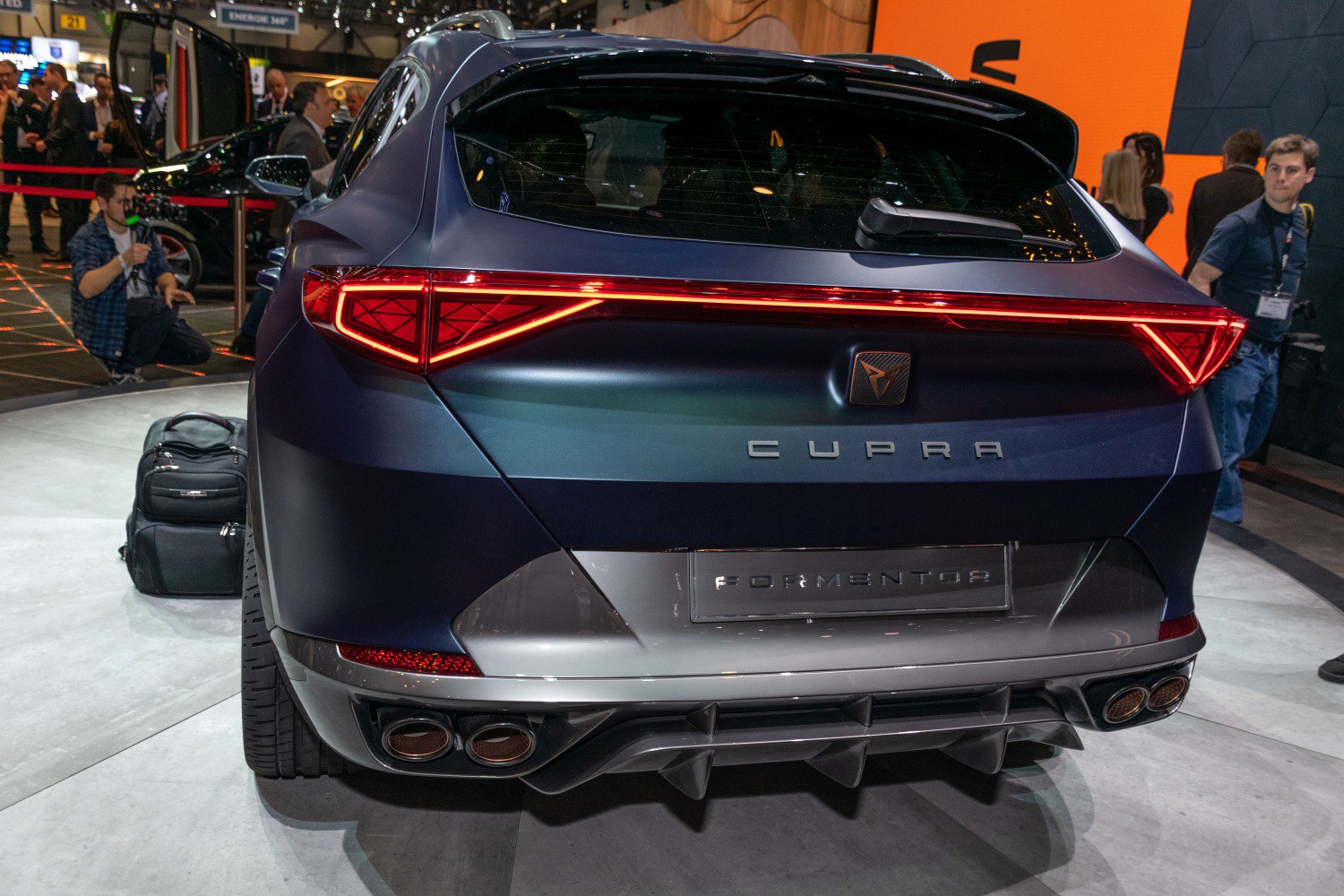 Rear view with distinctive LED taillights and quad exhaust pipes
