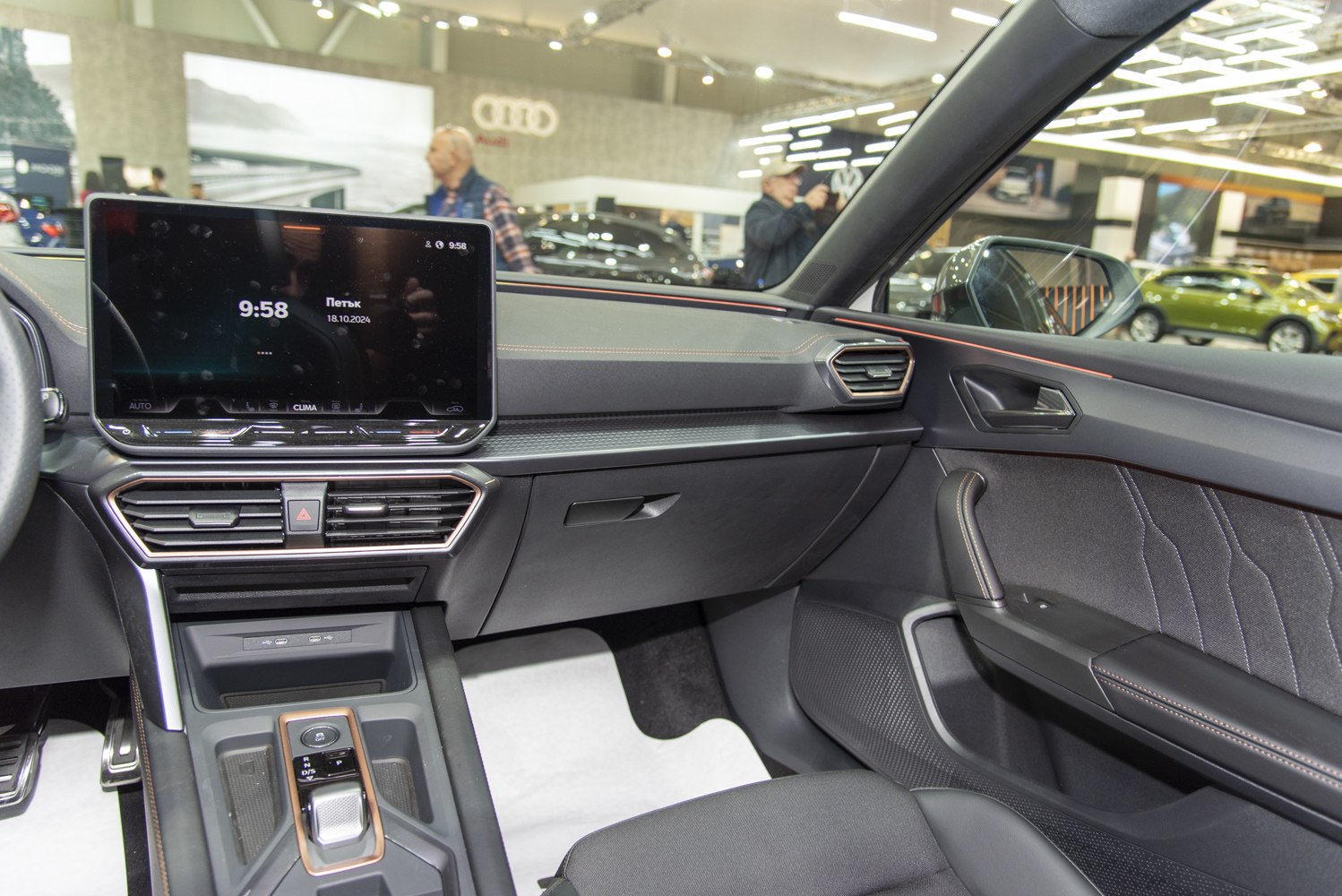 Modern touchscreen display and dashboard with center console in car interior