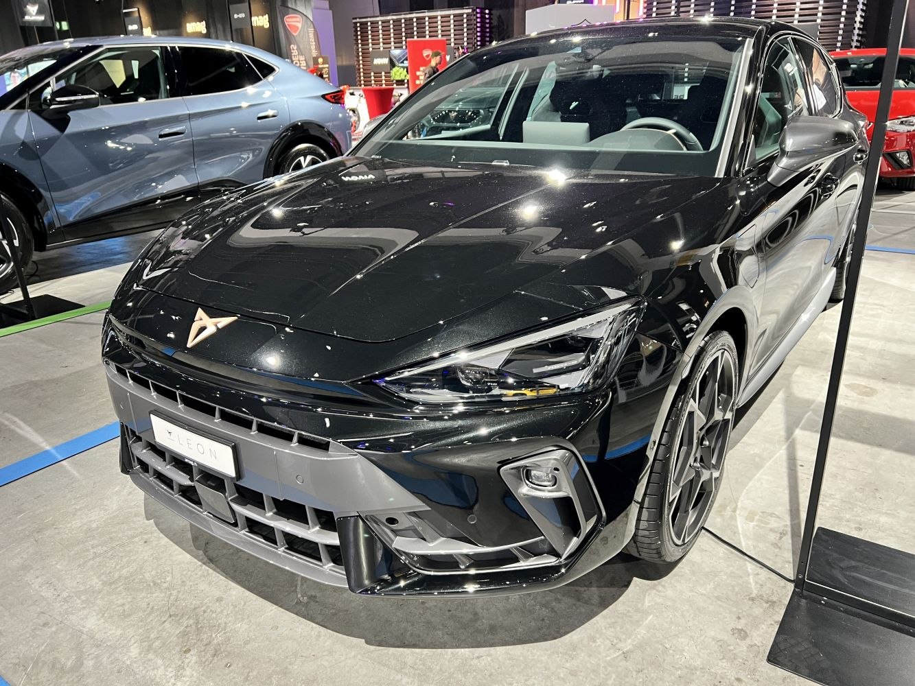 Sporty front fascia, sleek headlights, aggressive grille
