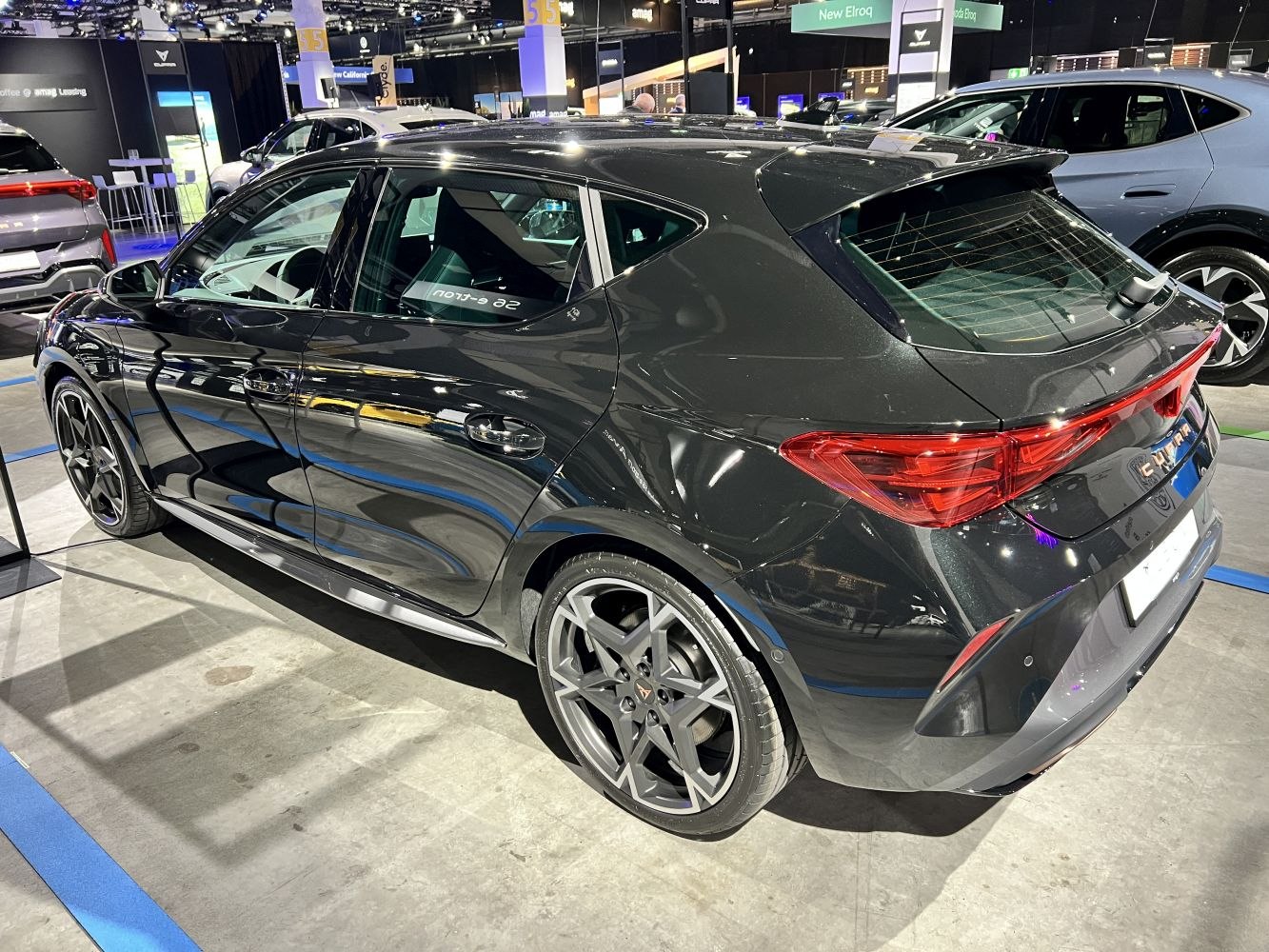 Rear-side view with sporty alloy wheels and sleek hatchback design