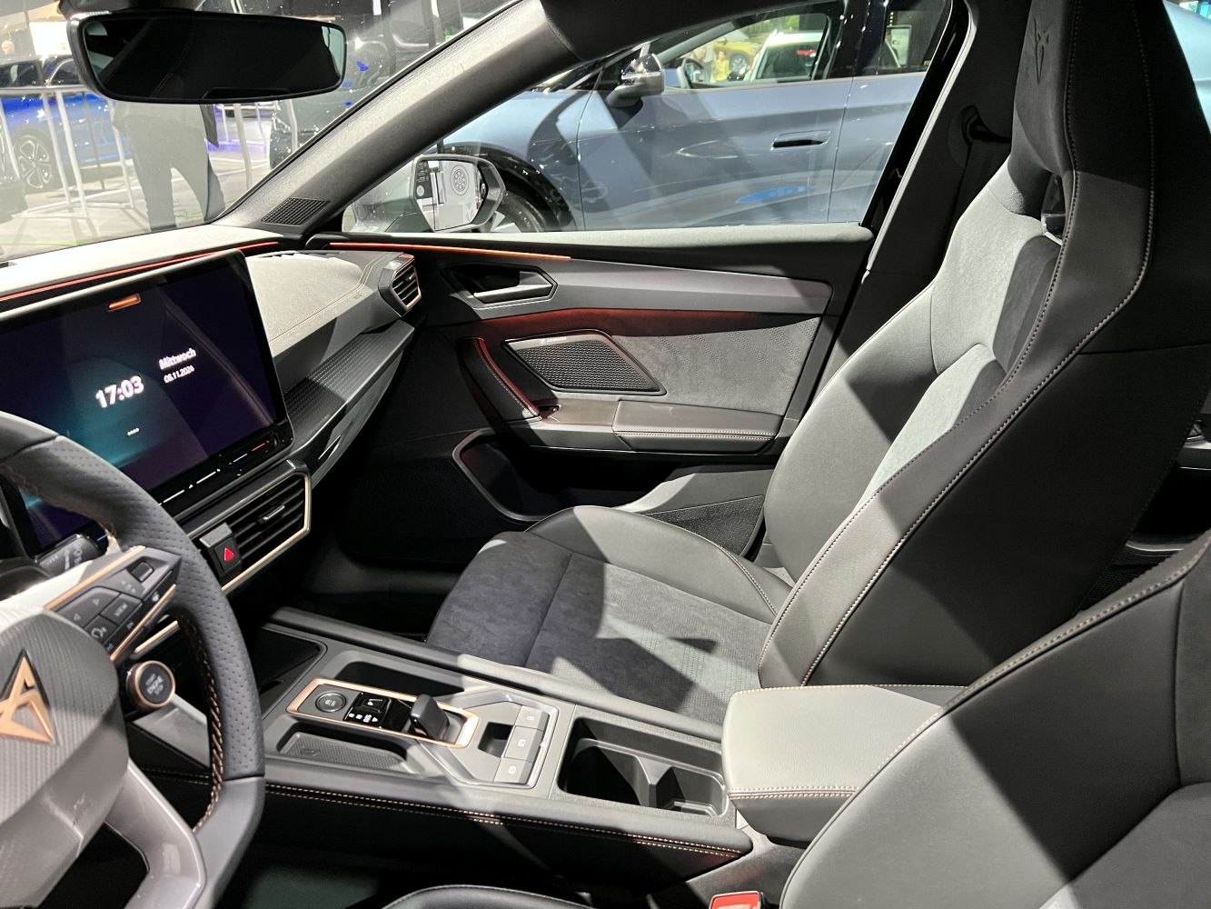 Modern car interior with digital cockpit and premium seats