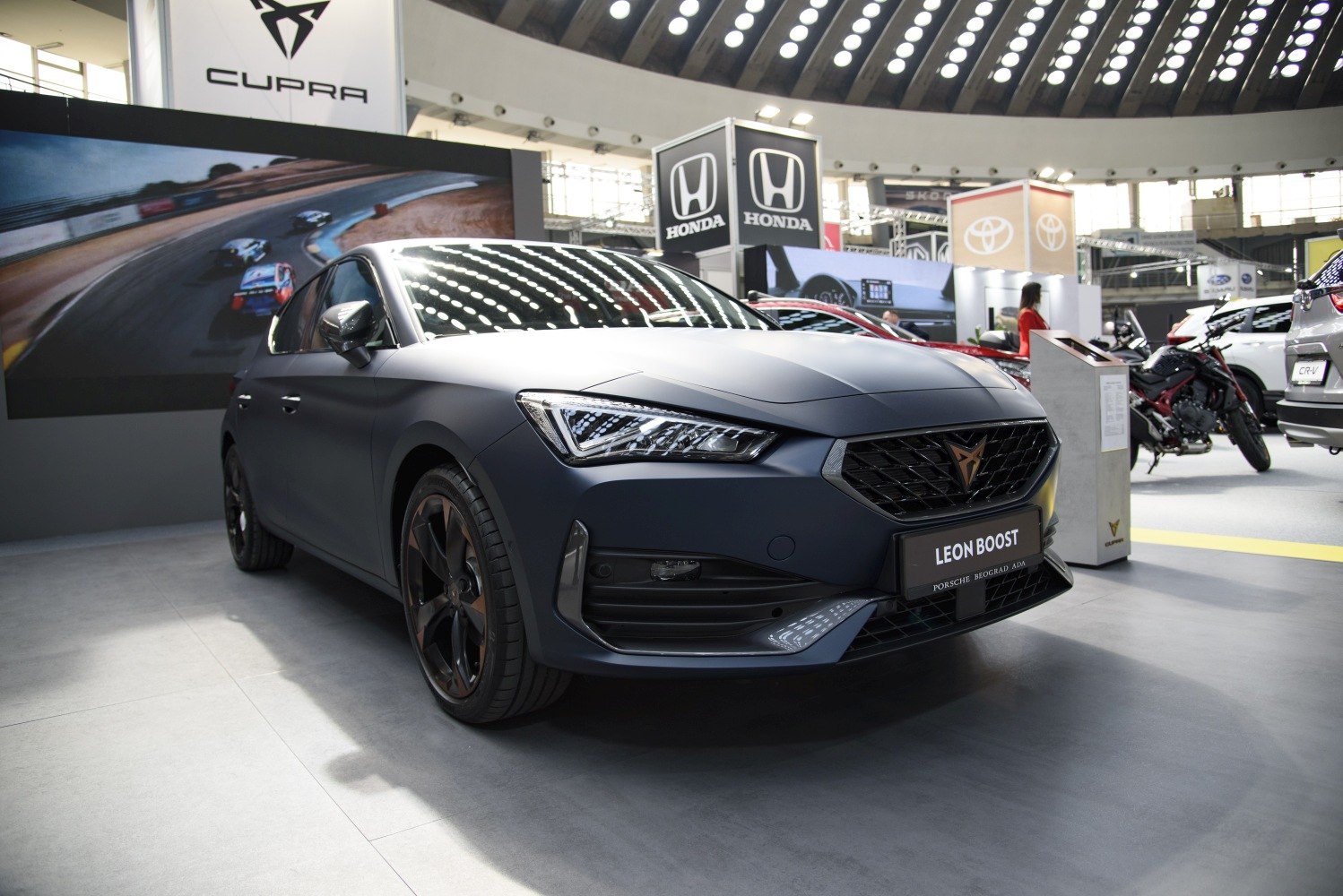 Front view featuring LED headlights, matte finish, sporty grille and alloy wheels