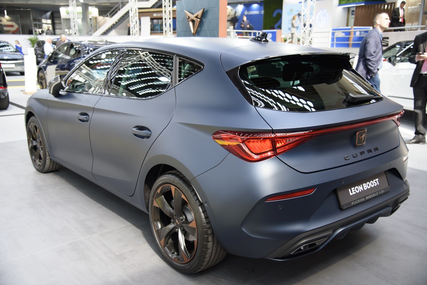 Rear side view with matte finish and alloy wheels