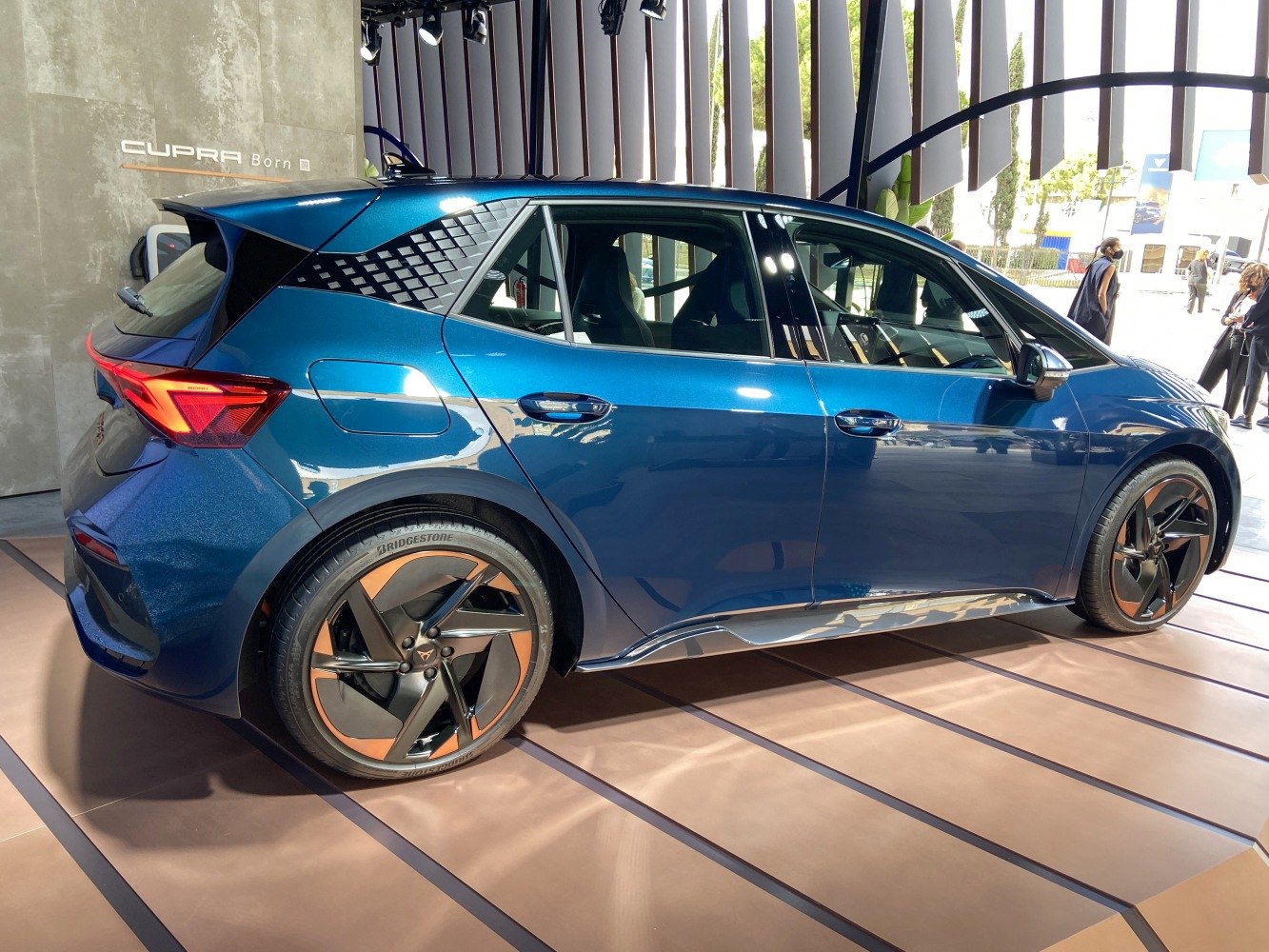 Side profile of a modern hatchback with stylish alloy wheels.
