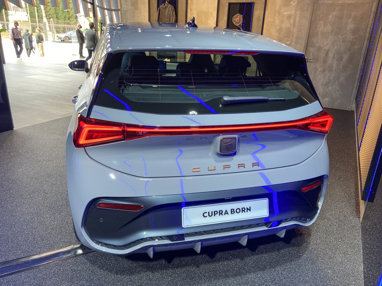 Rear LED tail light strip and hatchback design with rear window wiper