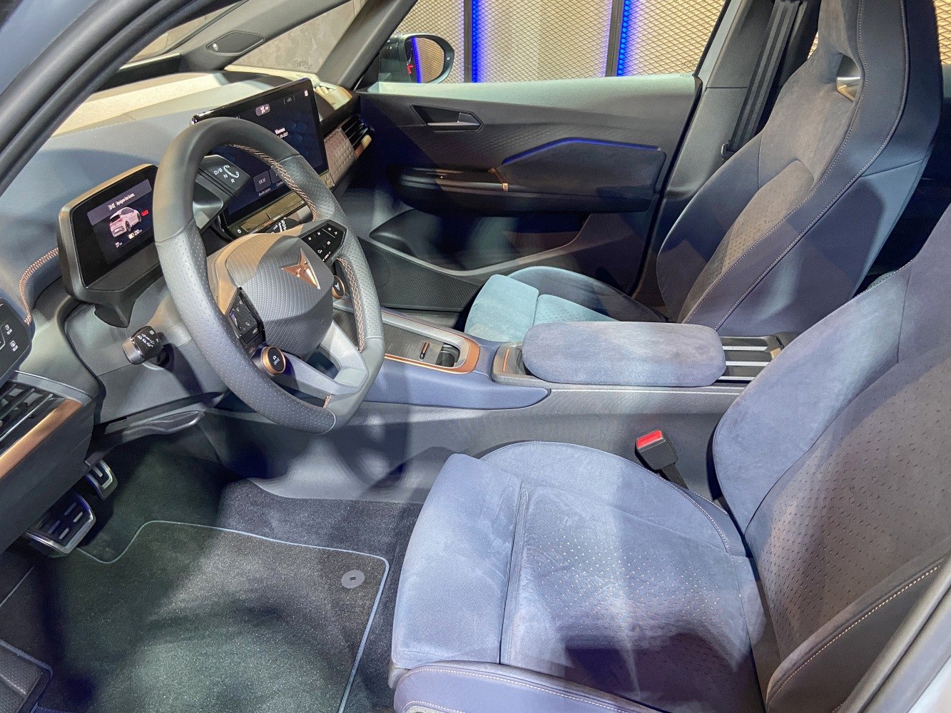 Dashboard, digital instrument cluster, and steering wheel in premium car interior