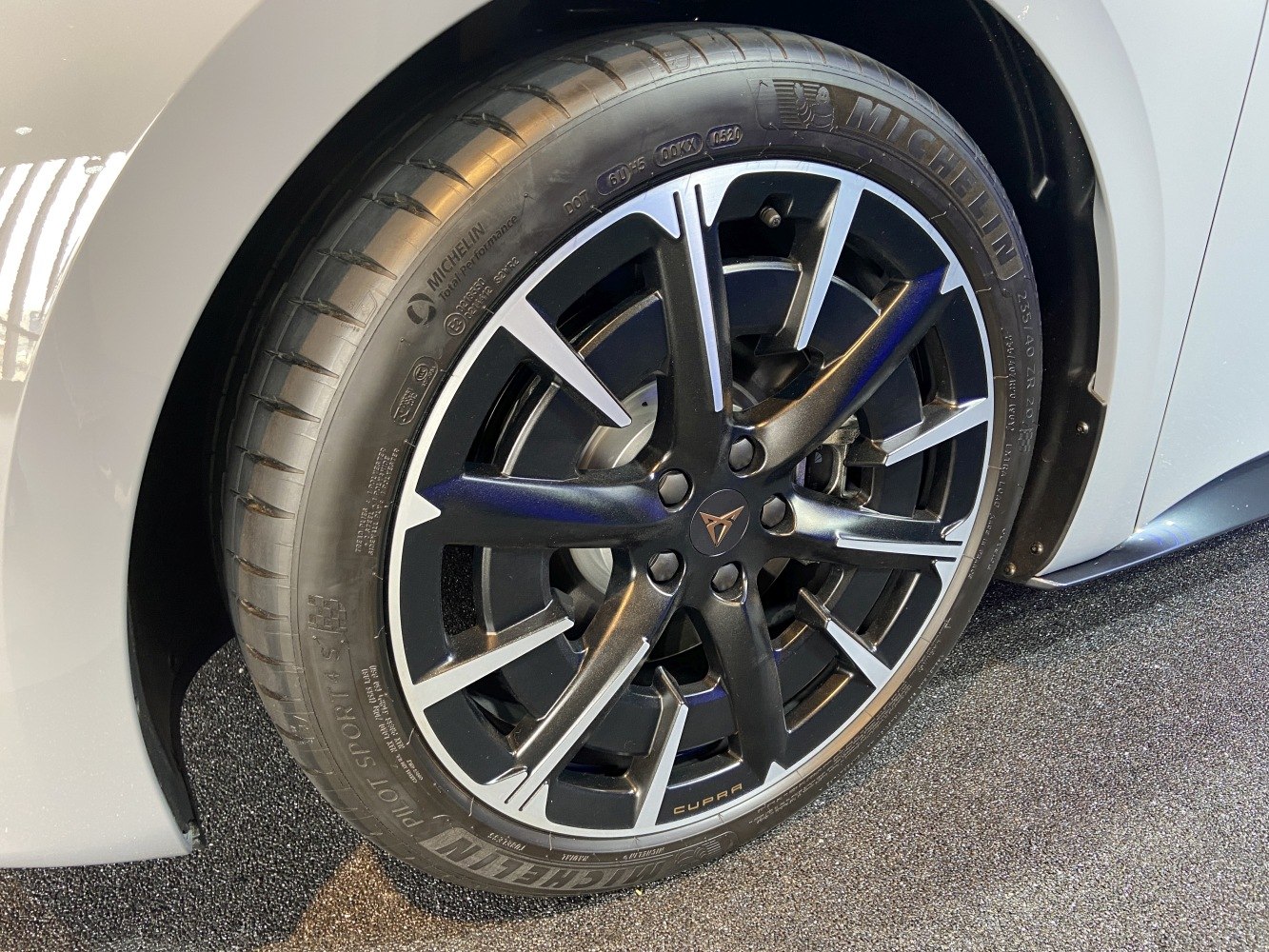 Close-up of stylish alloy wheel with Michelin Pilot Sport 4 tire.