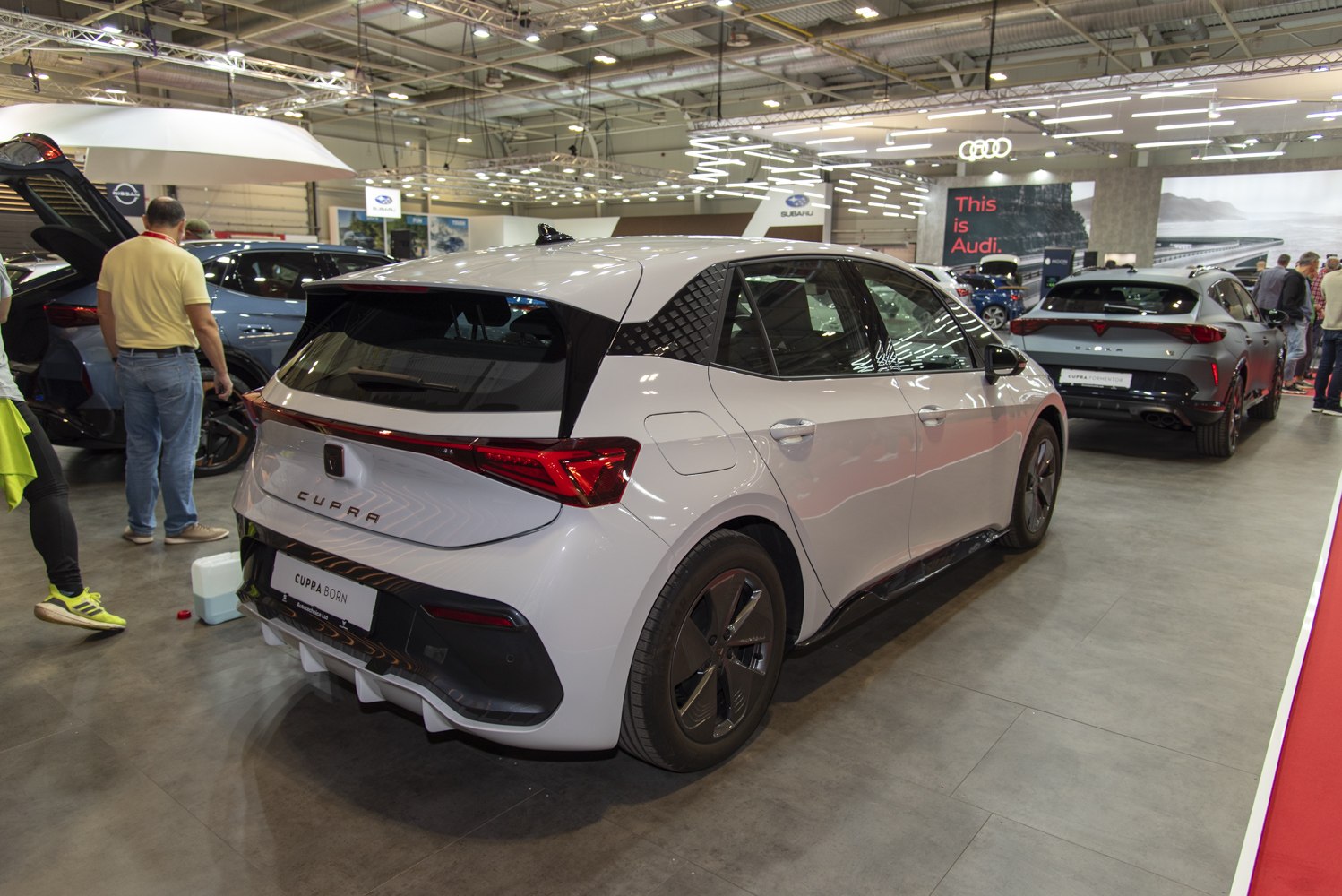 Rear view of modern electric hatchback with sleek lines and distinctive lights