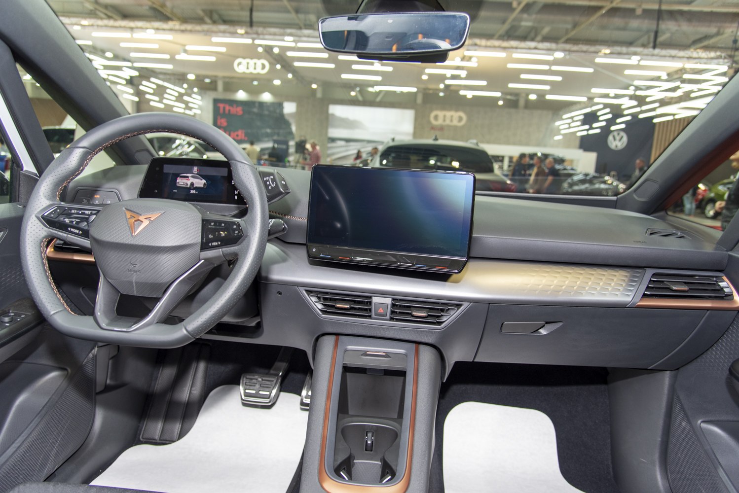 Digital dashboard and touchscreen infotainment with modern steering wheel design
