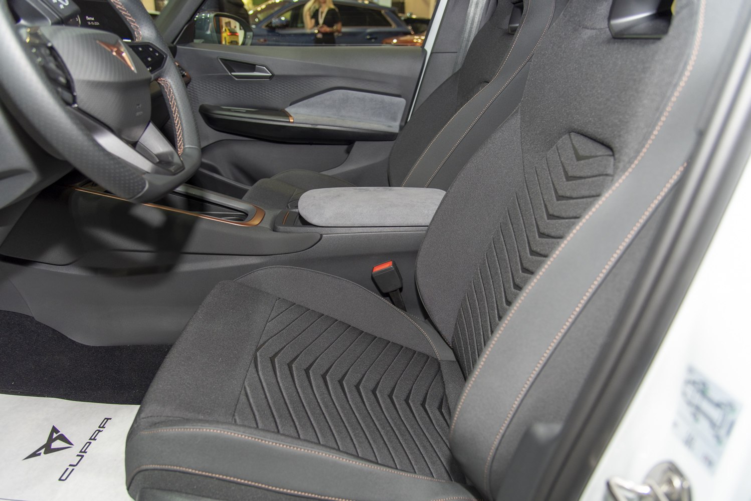 Modern interior seats with patterned upholstery and center armrest