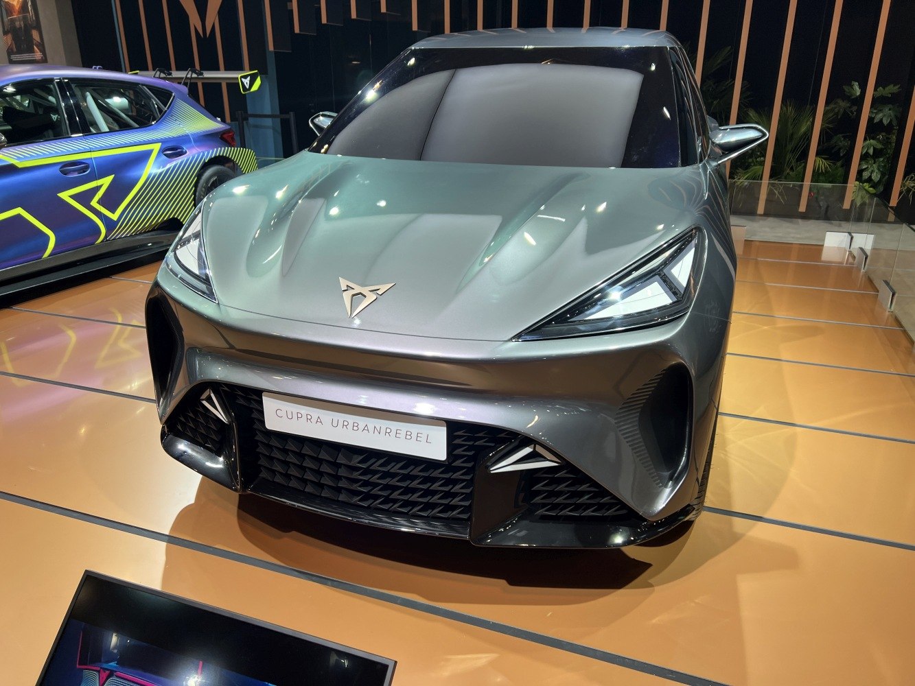 Futuristic front design with sharp LED headlights and aggressive aerodynamic bumper