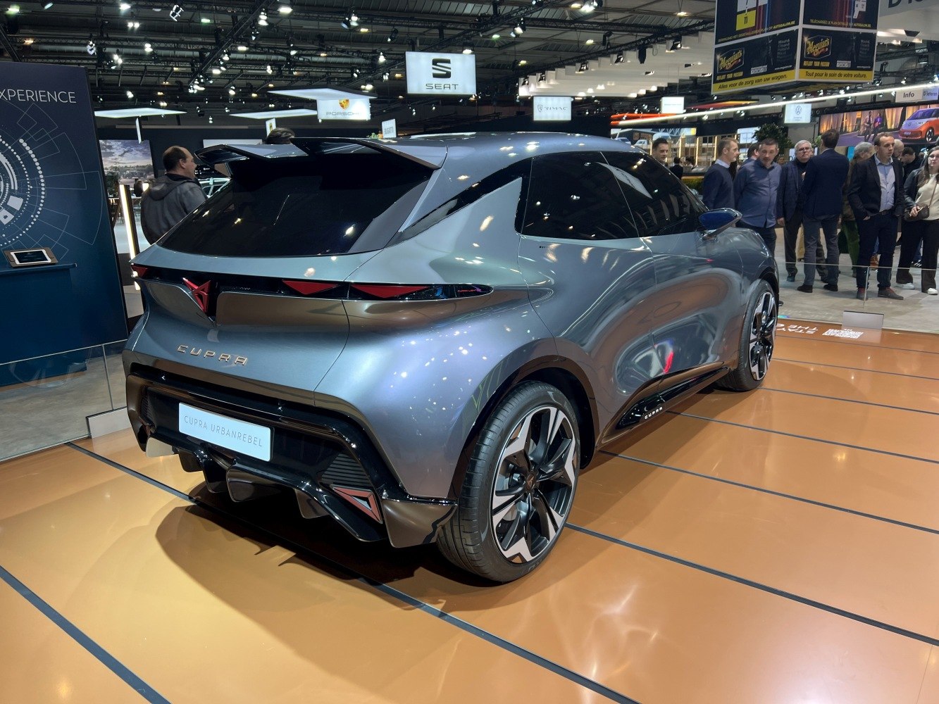 Futuristic rear and side design with aerodynamic features and distinctive alloy wheels