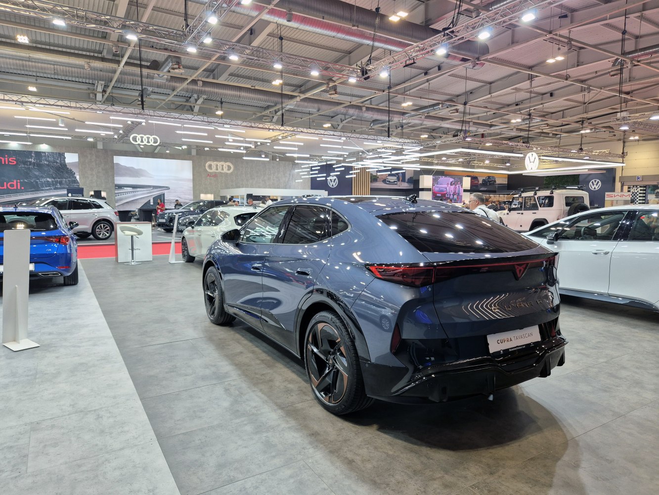 Modern electric SUV rear with LED tail light strip and aerodynamic styling