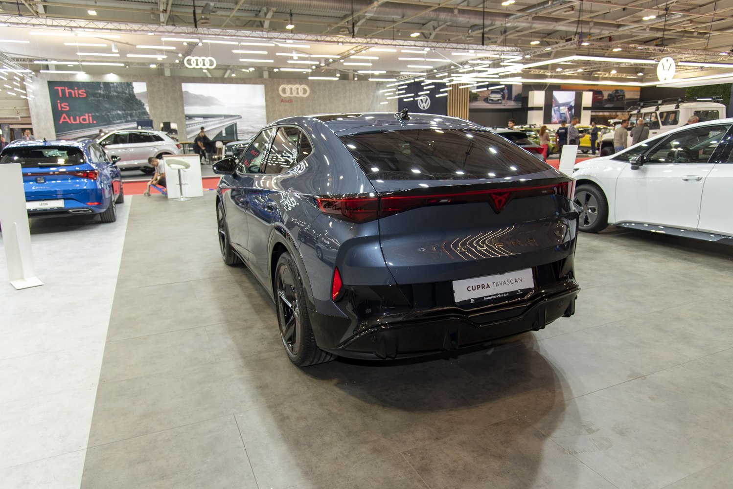 Sleek rear design and taillight of an electric SUV.