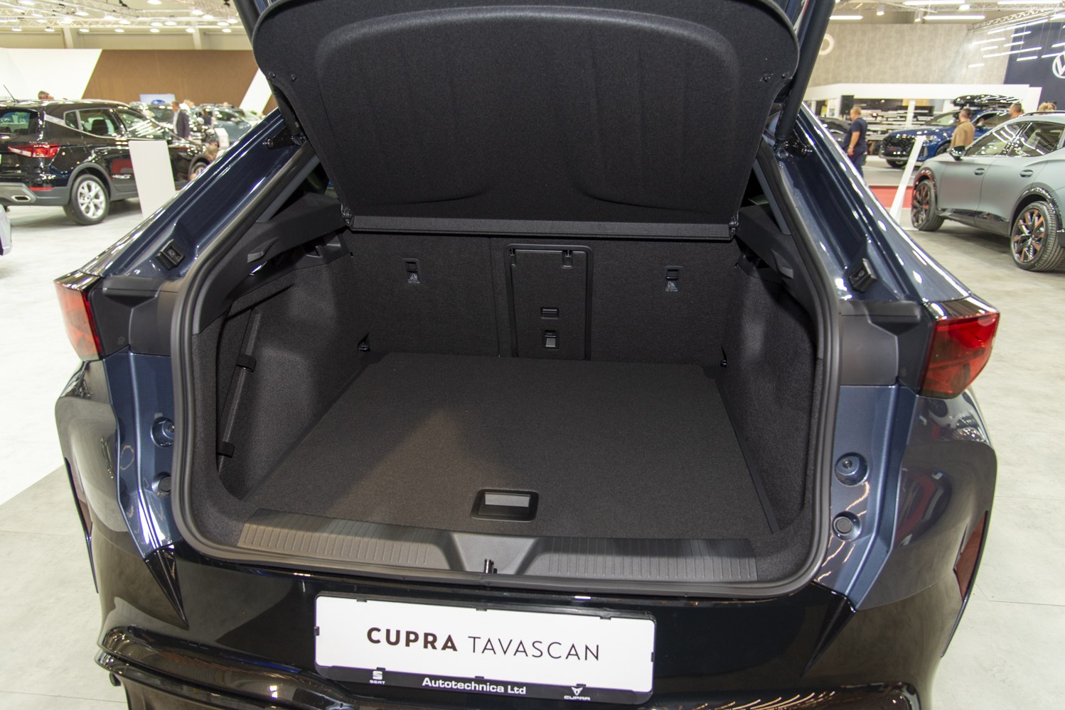 Spacious rear trunk cargo area with clean design and foldable rear seats