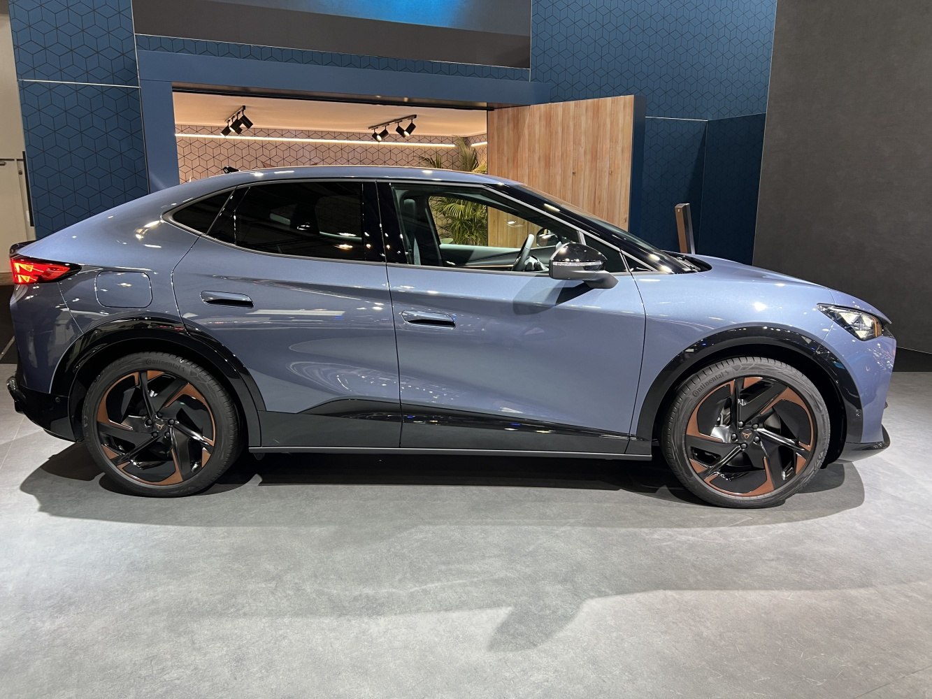 Side profile of an electric SUV with distinct alloy wheels and smooth contours