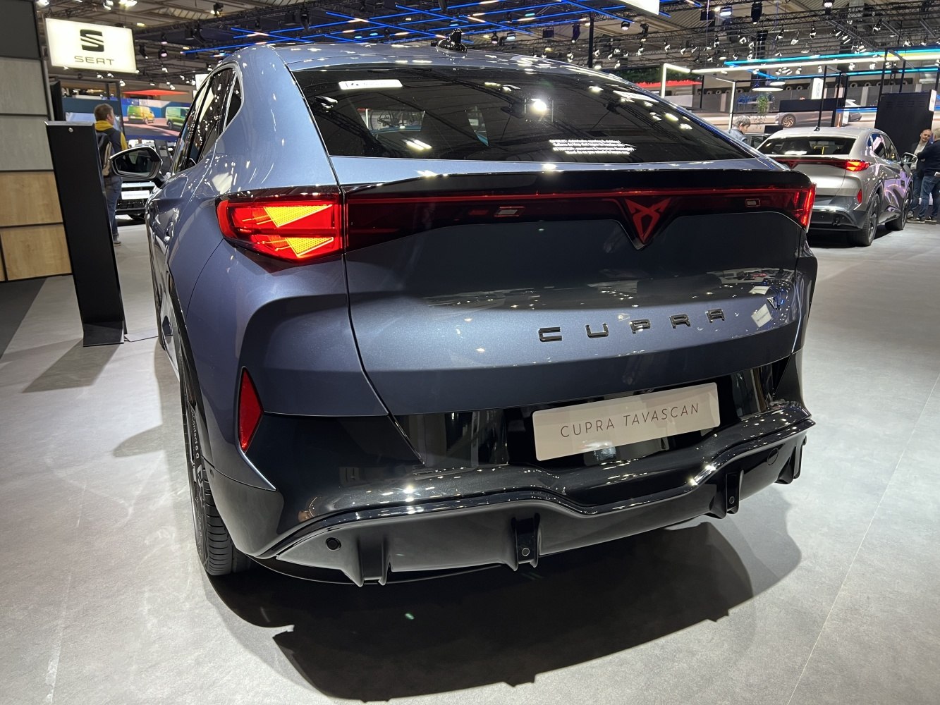 Rear view featuring bold LED tail lights and aerodynamic design.