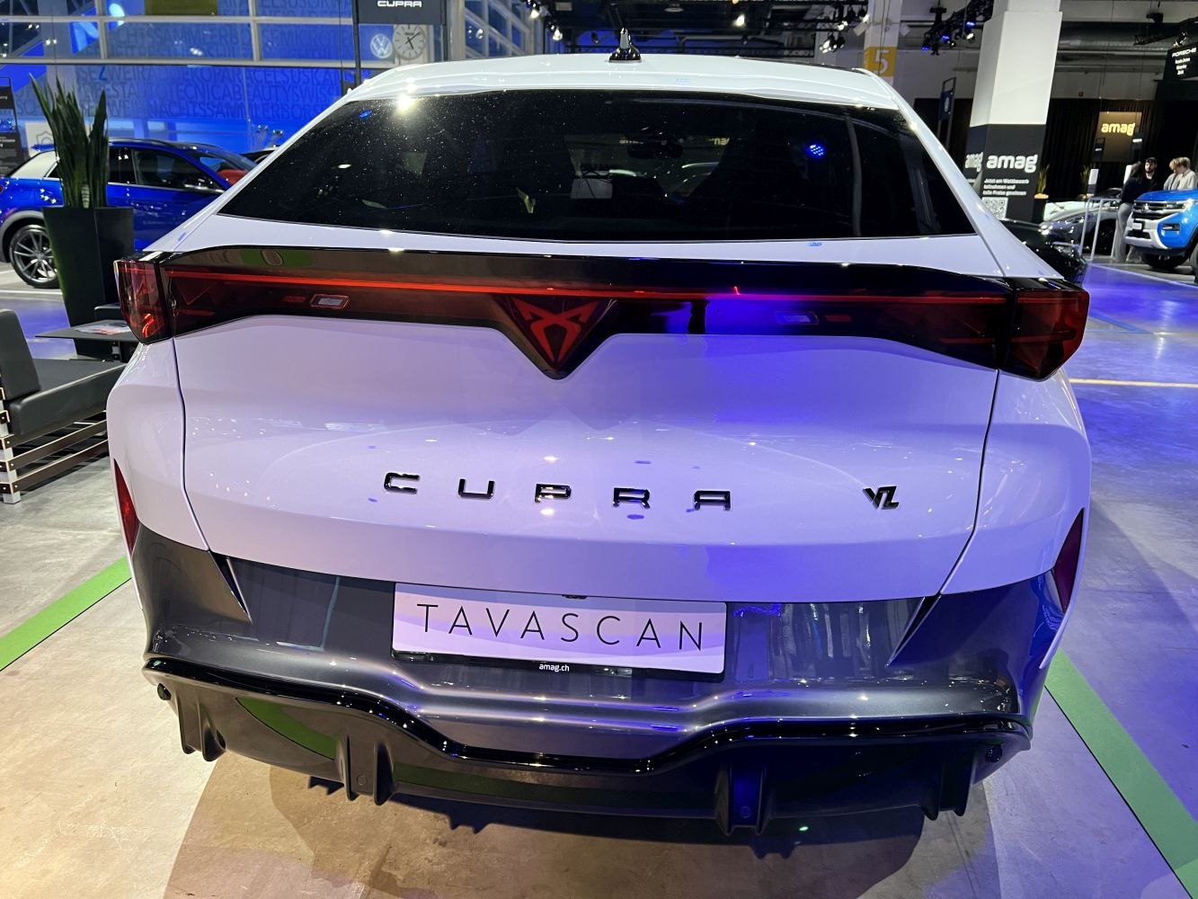 Sleek rear LED tail light bar and sporty electric SUV design