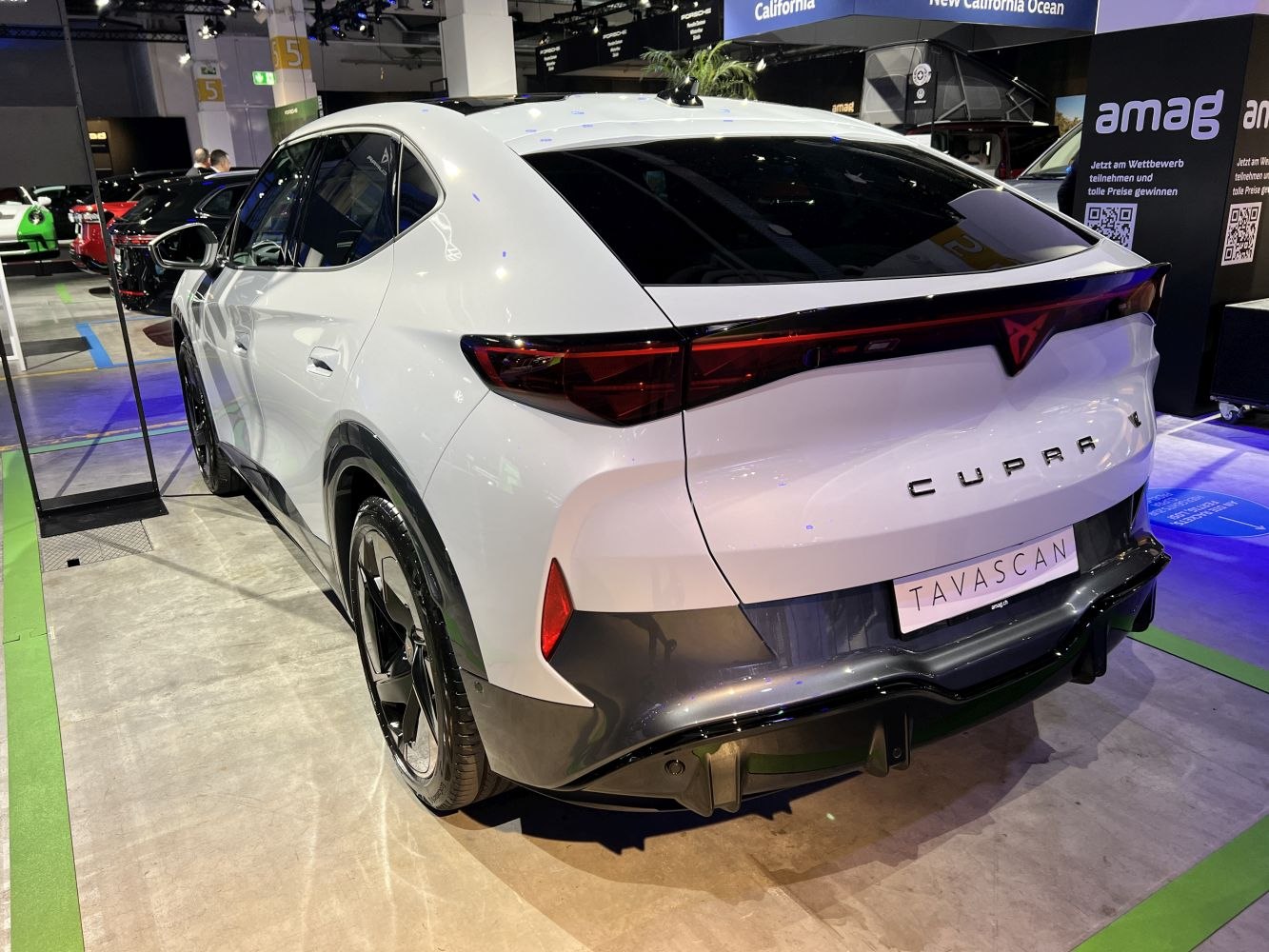 Rear view with continuous tail light bar and sporty diffuser