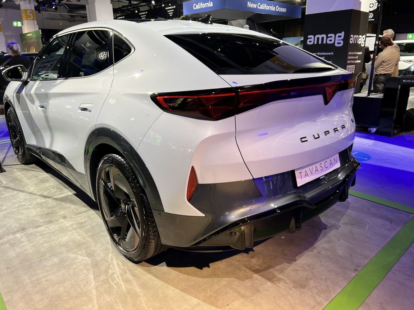 Rear and side view with sleek taillights and black alloy wheels
