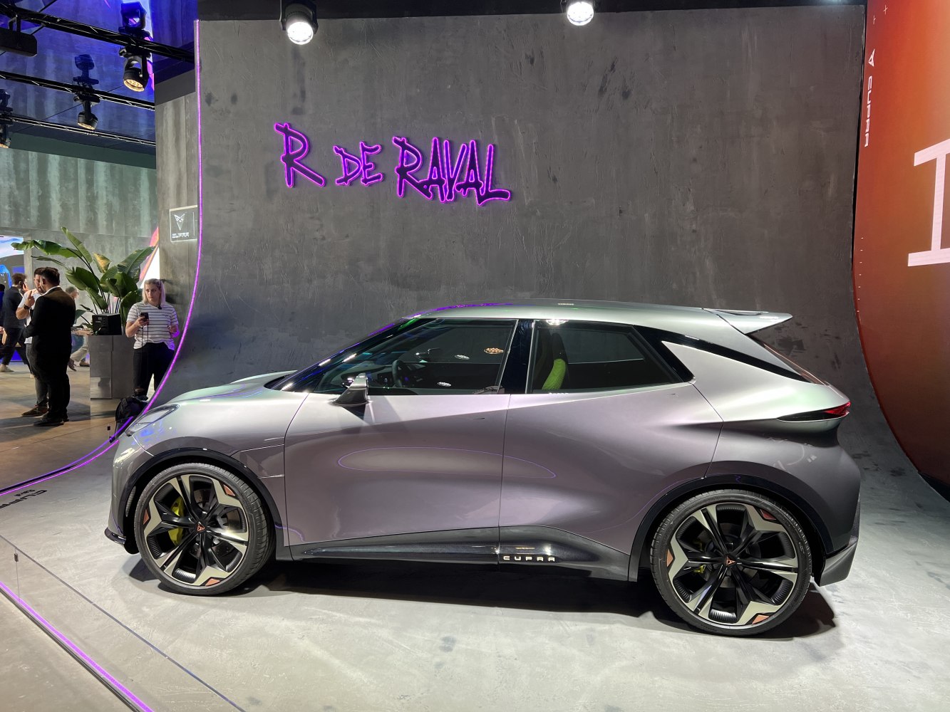 Futuristic electric vehicle with aerodynamic design and large alloy wheels