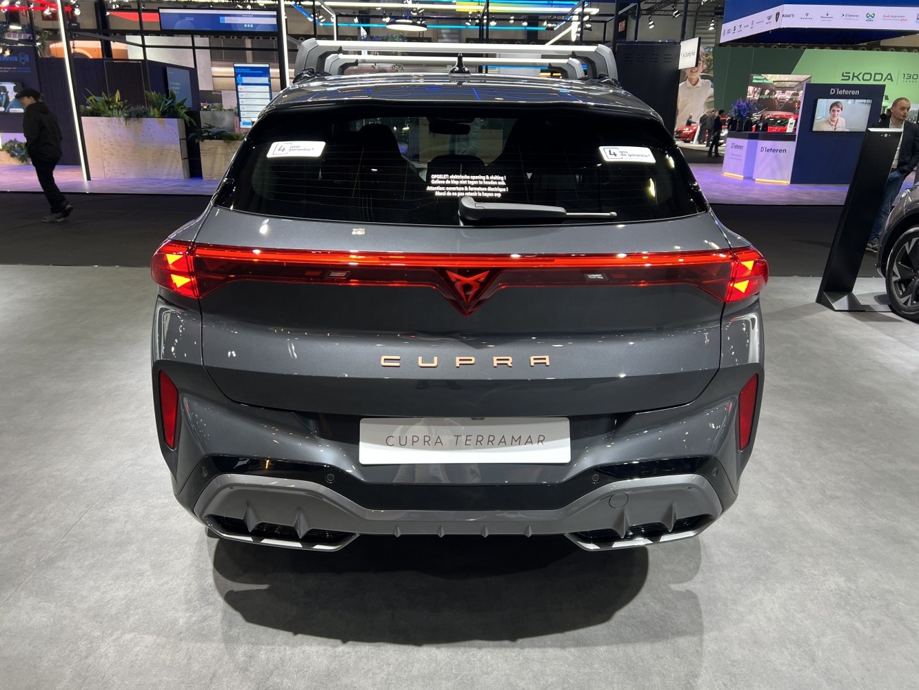 Rear view of a vehicle with continuous LED taillight and rear diffuser