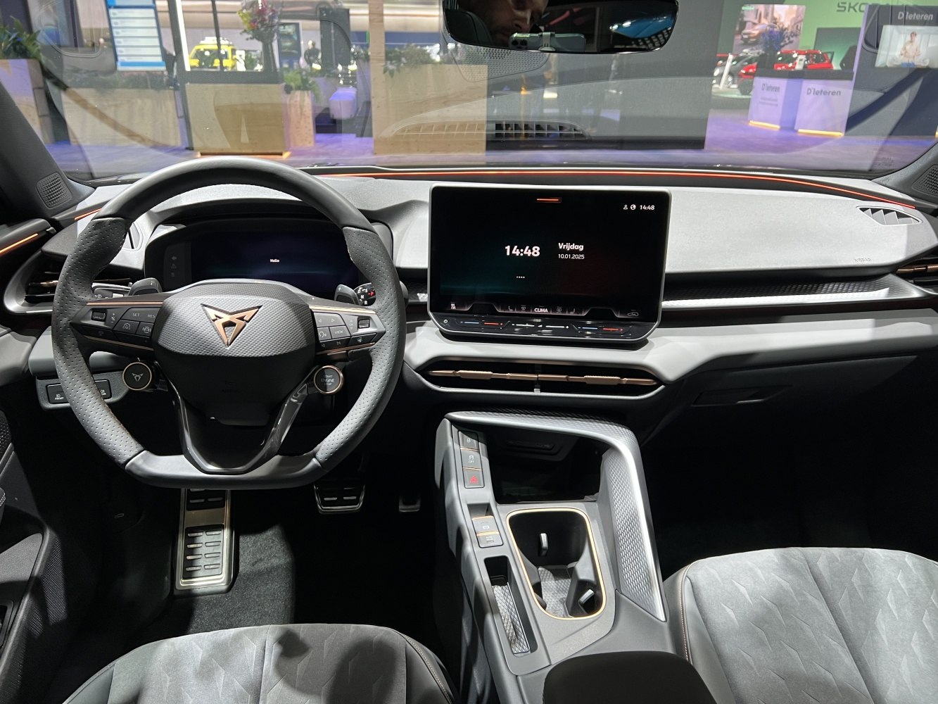 Modern car interior with digital dashboard and multifunction steering wheel