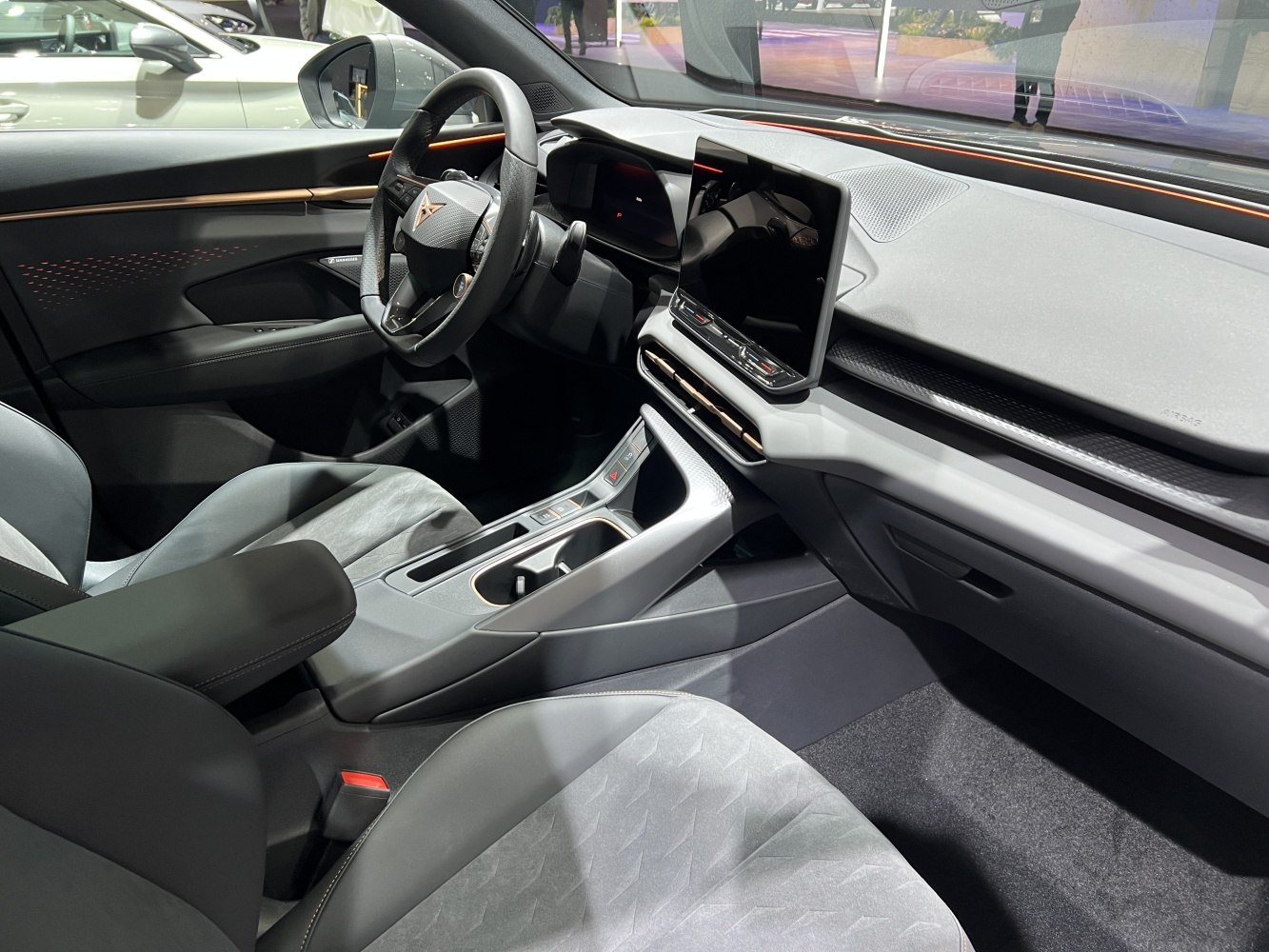 Digital dashboard and central touchscreen infotainment in car interior