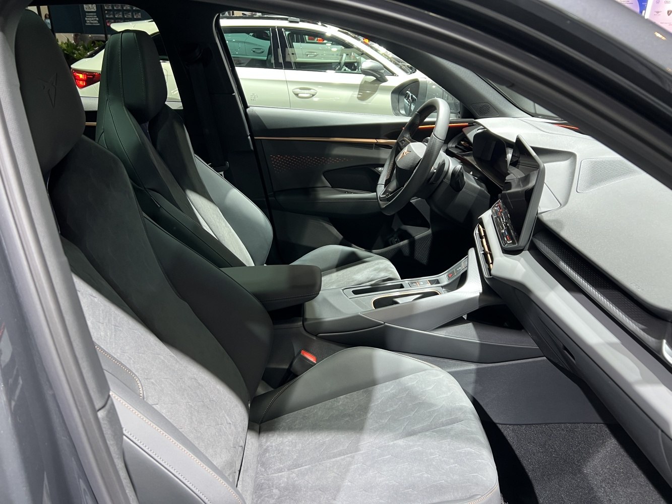 Sporty seats, digital dashboard, and modern center console