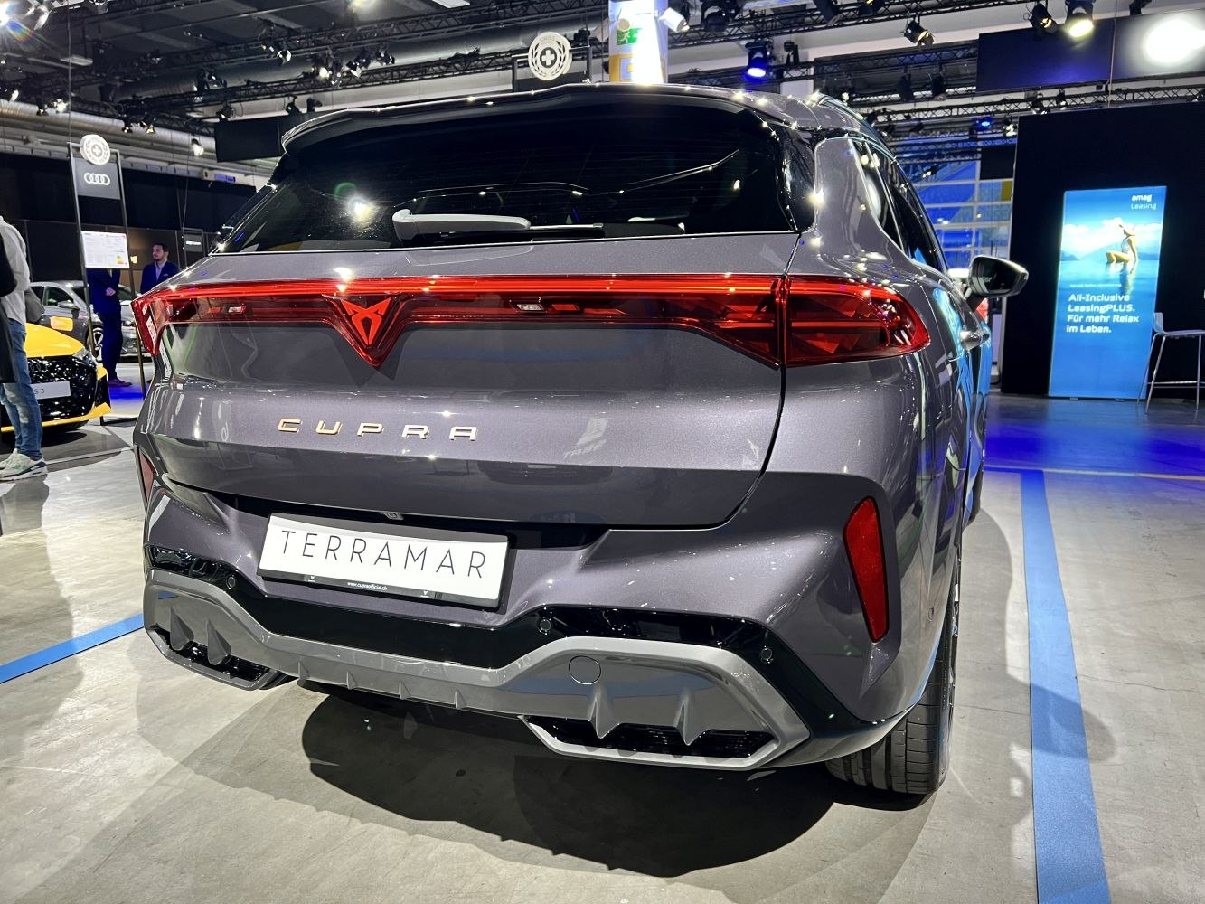 Rear view with full-width LED light bar and sporty diffuser
