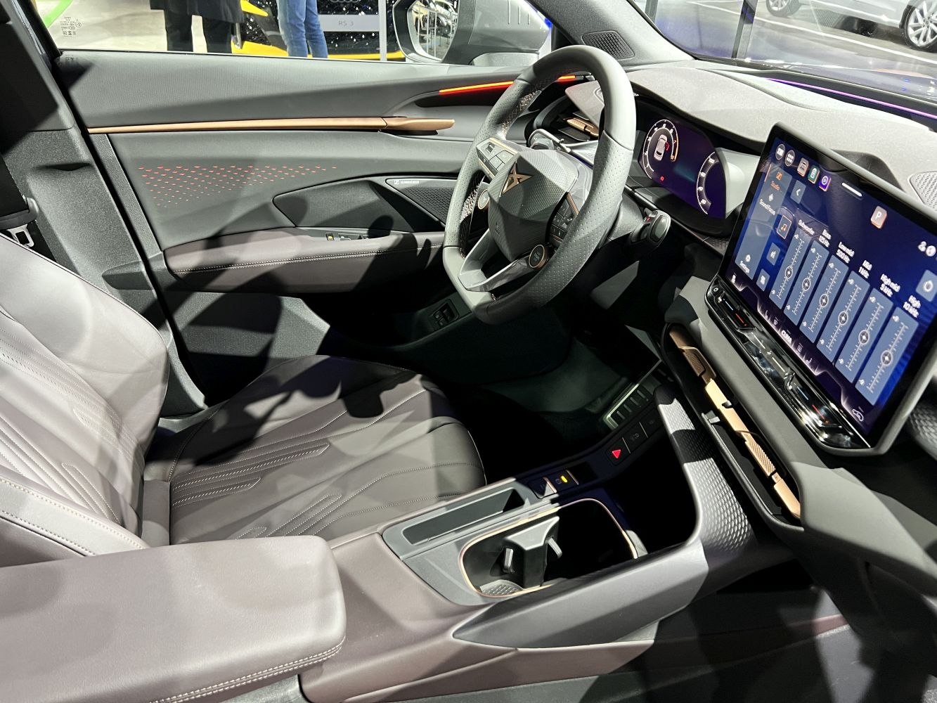 Digital dashboard and touchscreen center console with modern steering wheel design