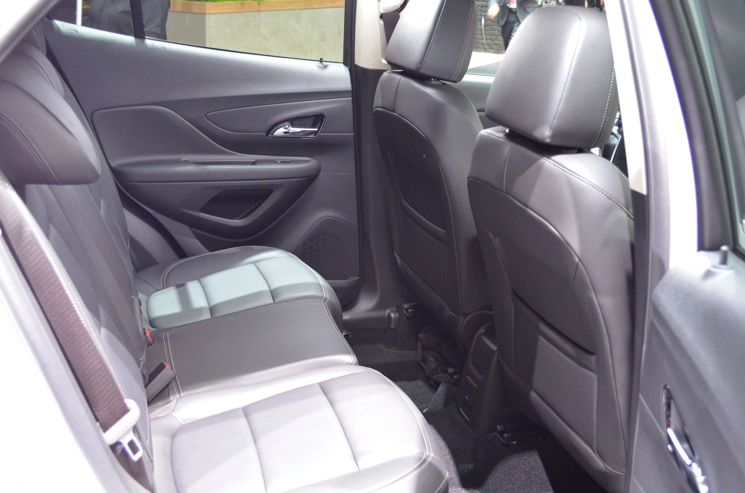 Leather rear seats with spacious legroom and modern door panel