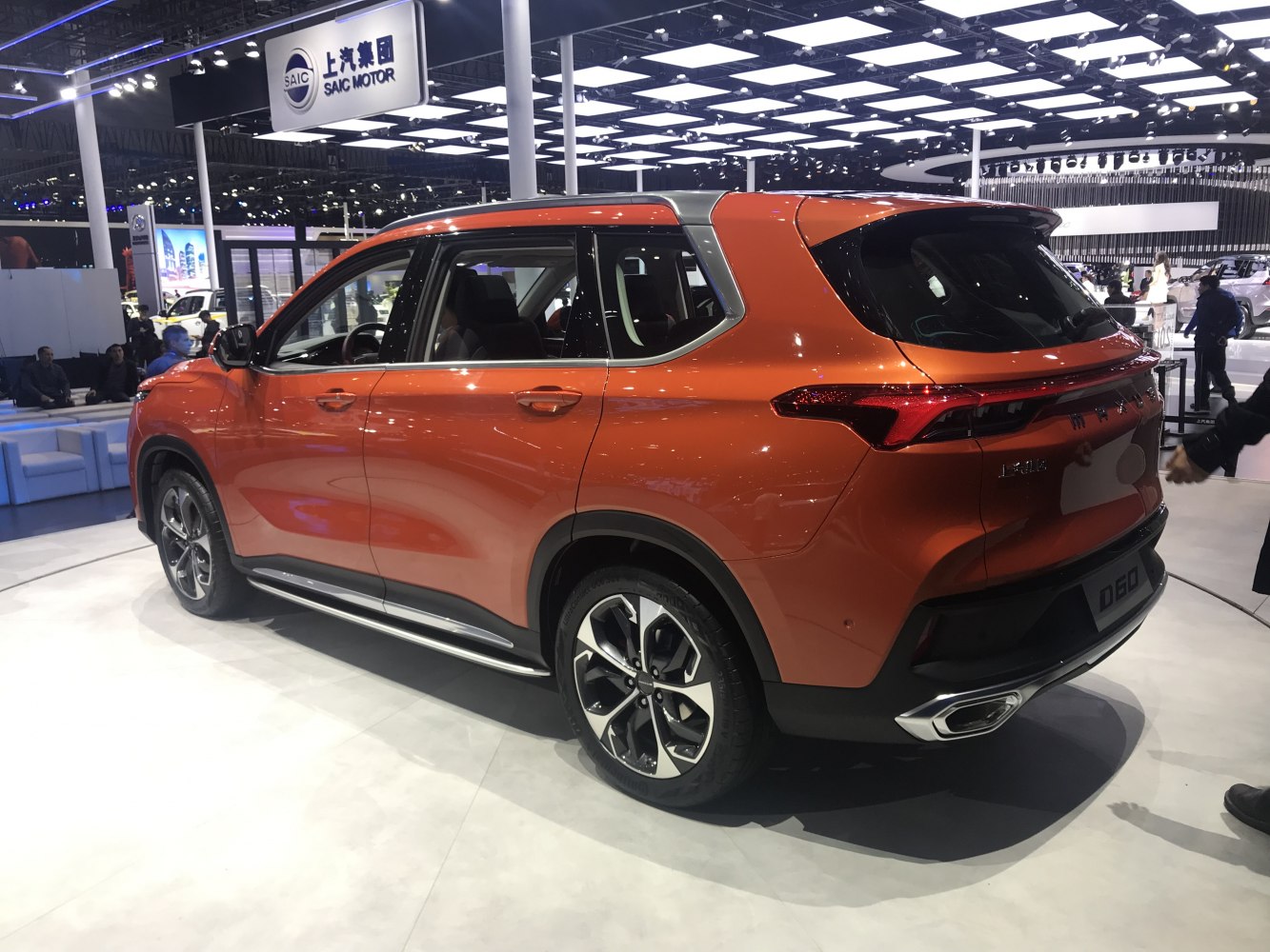 Rear side view of modern SUV with alloy wheels and rear LED lights