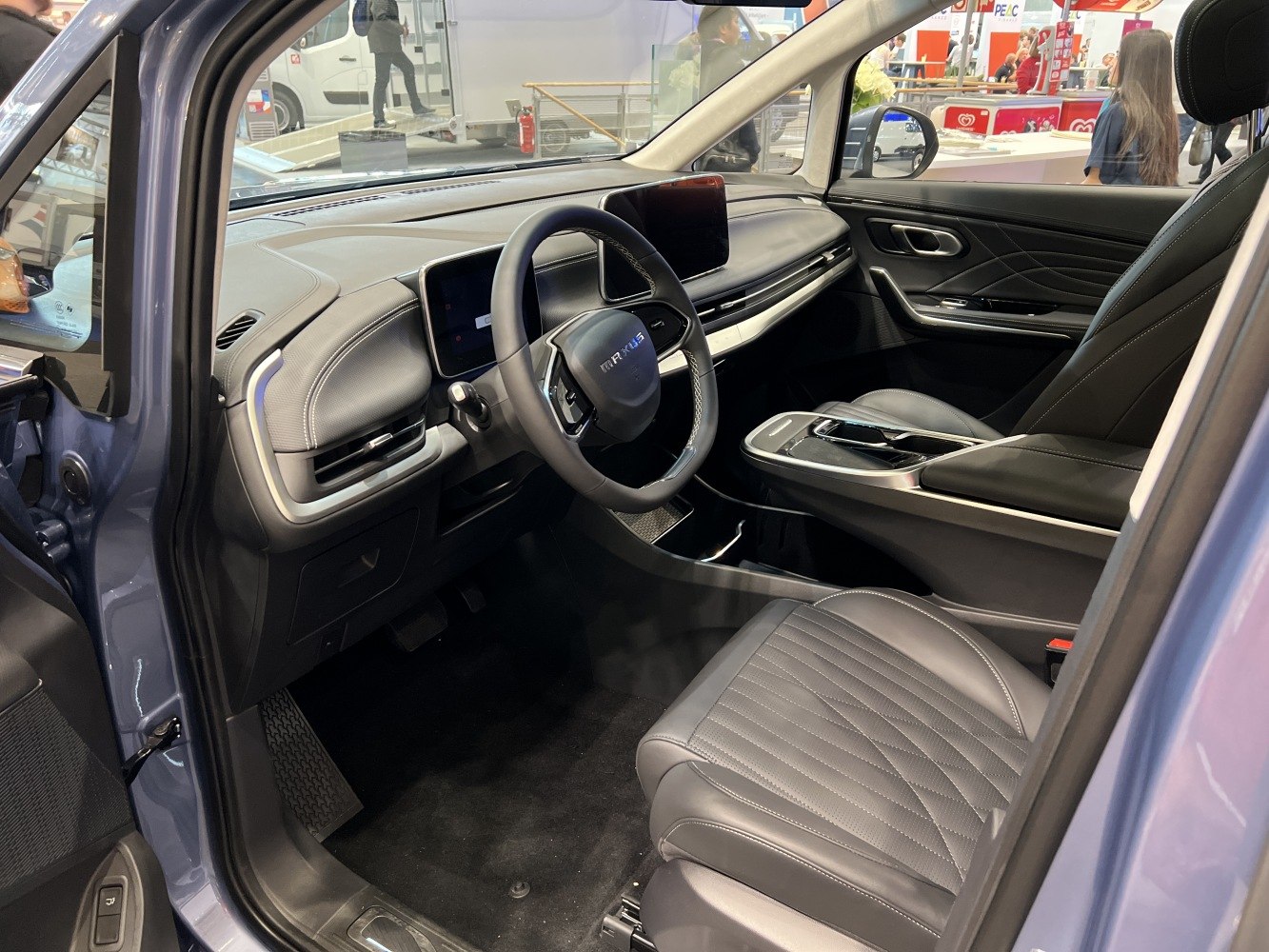 Modern car interior with digital dashboard and steering wheel modern design.
