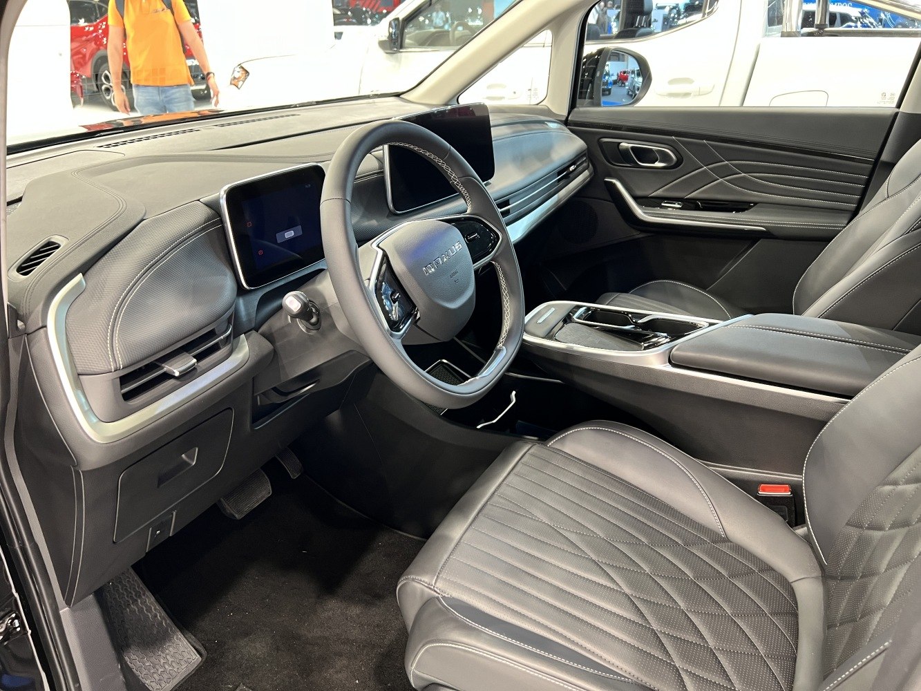 Digital dashboard and touchscreen displays with leather seats