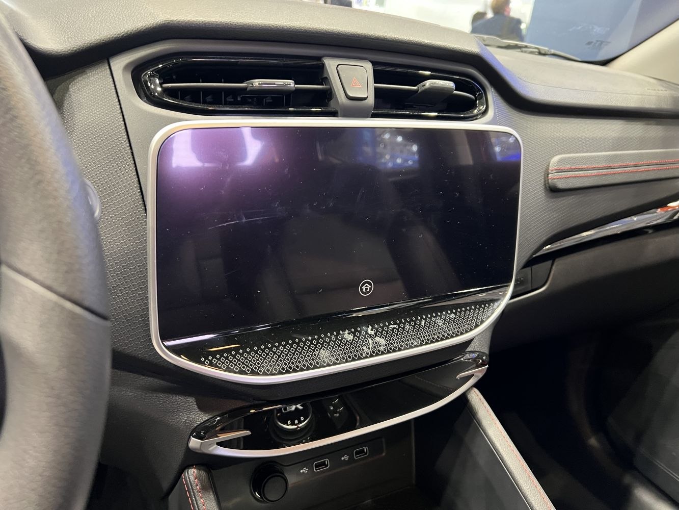 Touchscreen infotainment and dashboard with control buttons