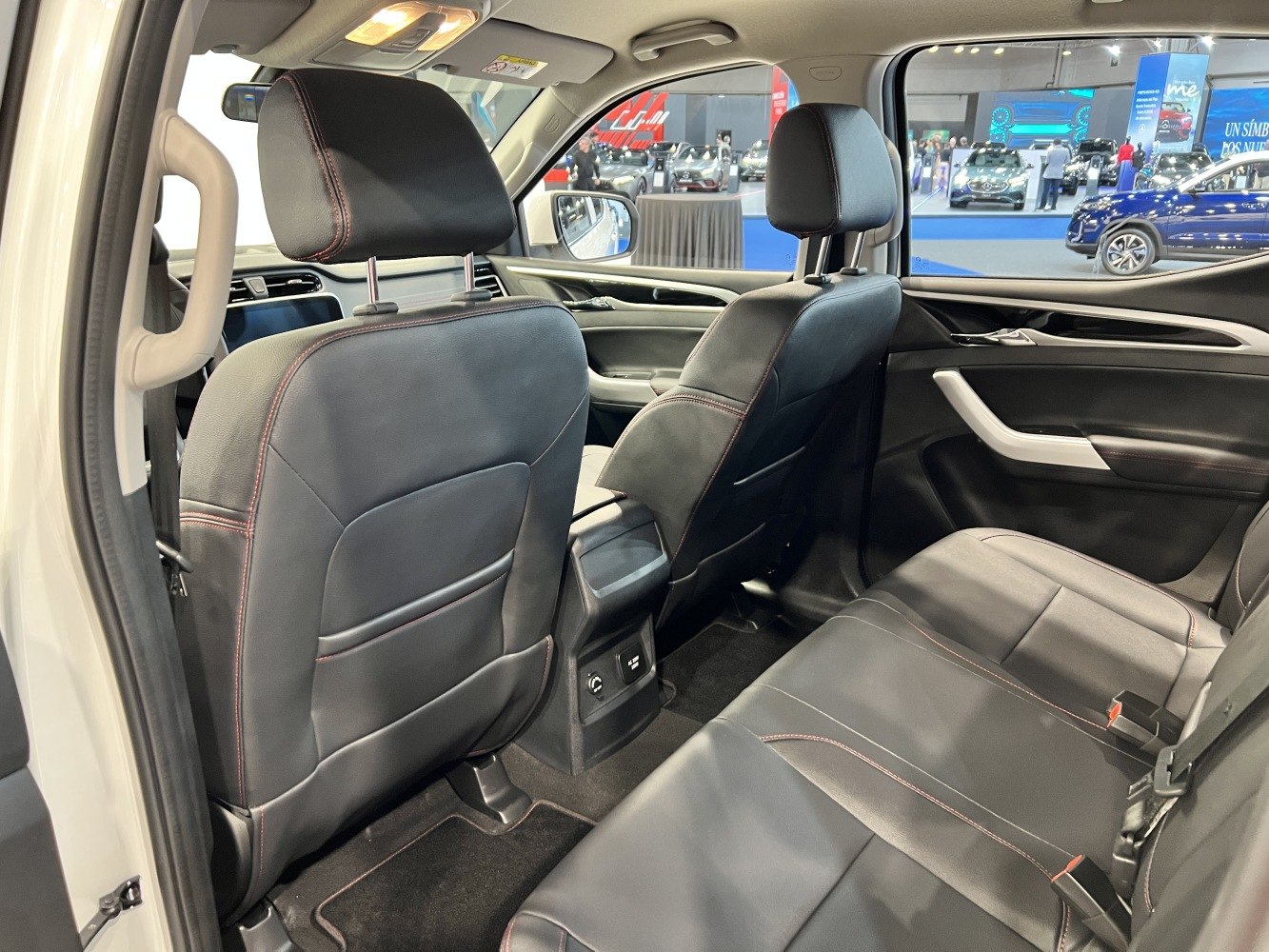 Black leather rear seats and spacious interior with front seat backs