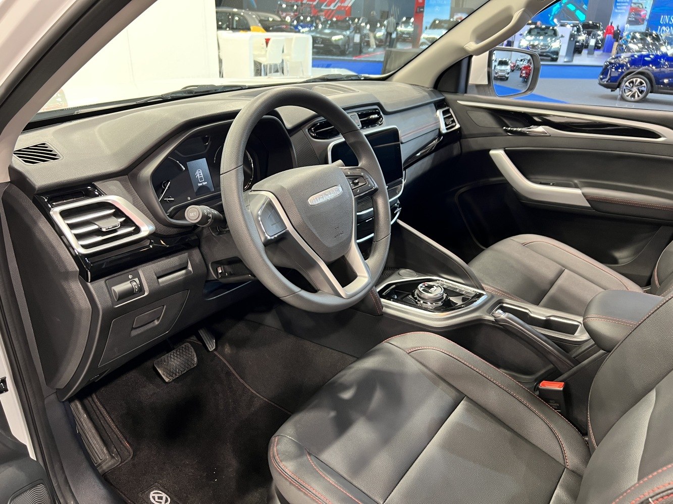 Modern dashboard and steering wheel with leather seats and digital display