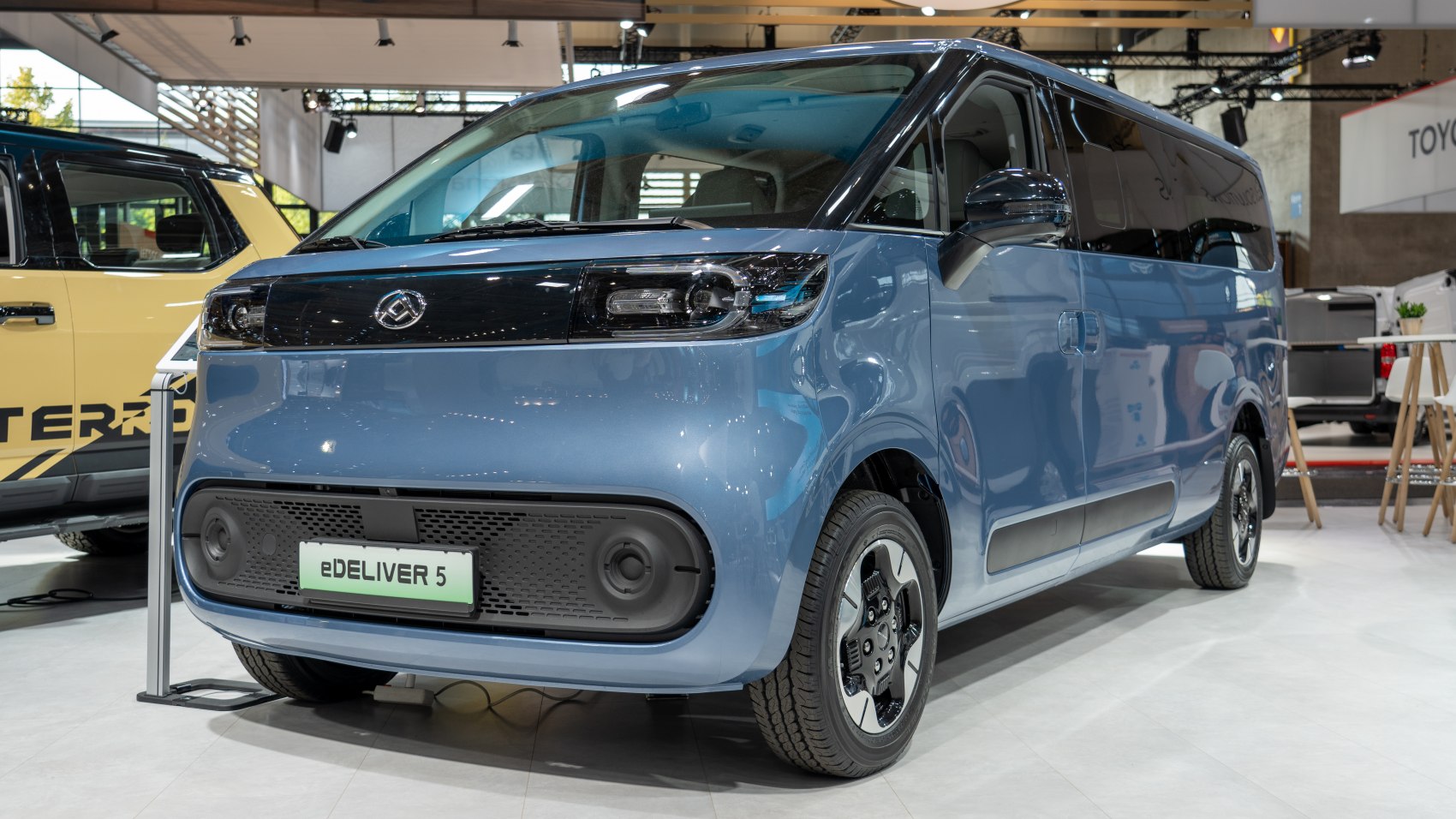 Futuristic front design electric delivery van with compact, aerodynamic body