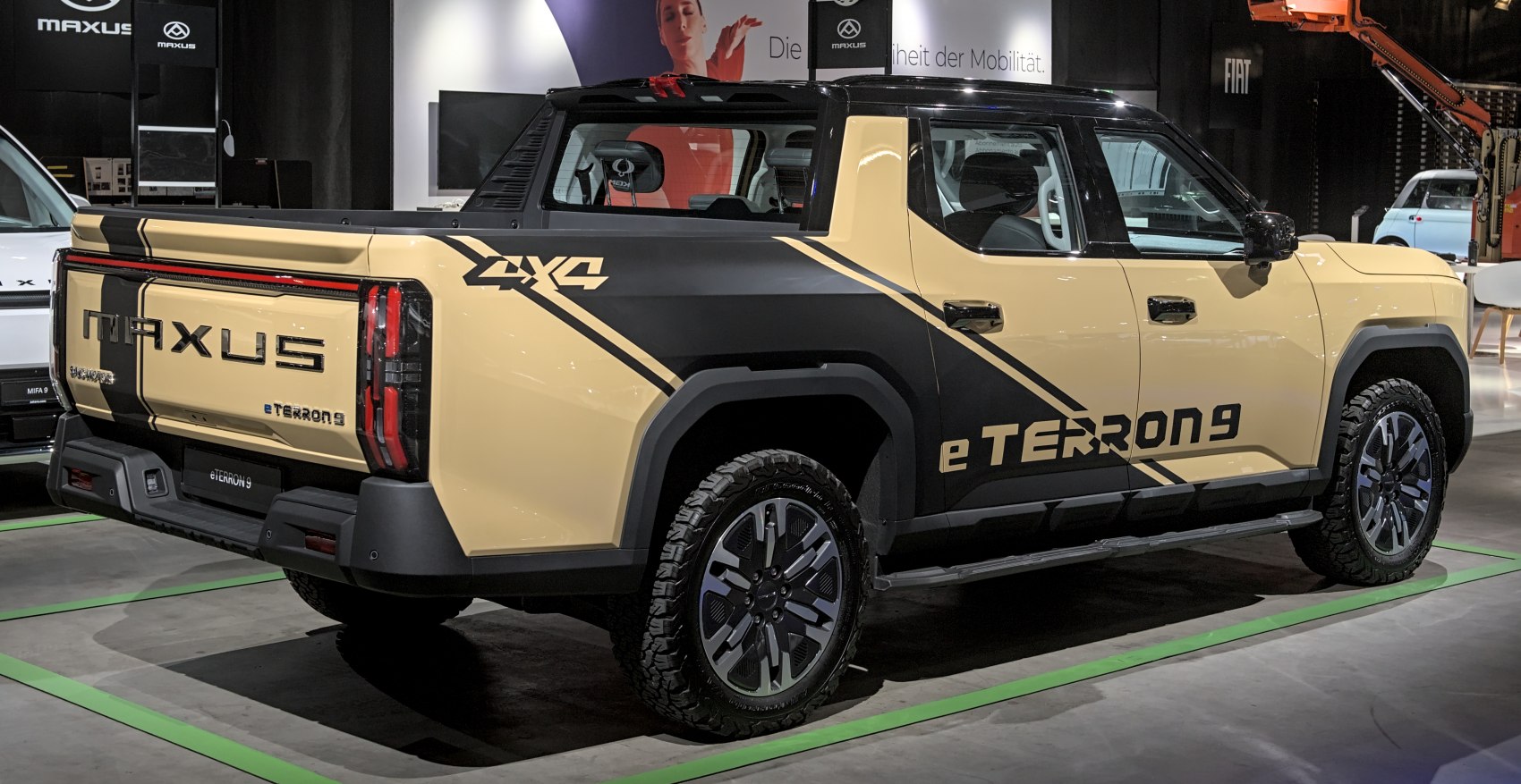 Pickup truck rear side with 4x4 badge and rugged tires
