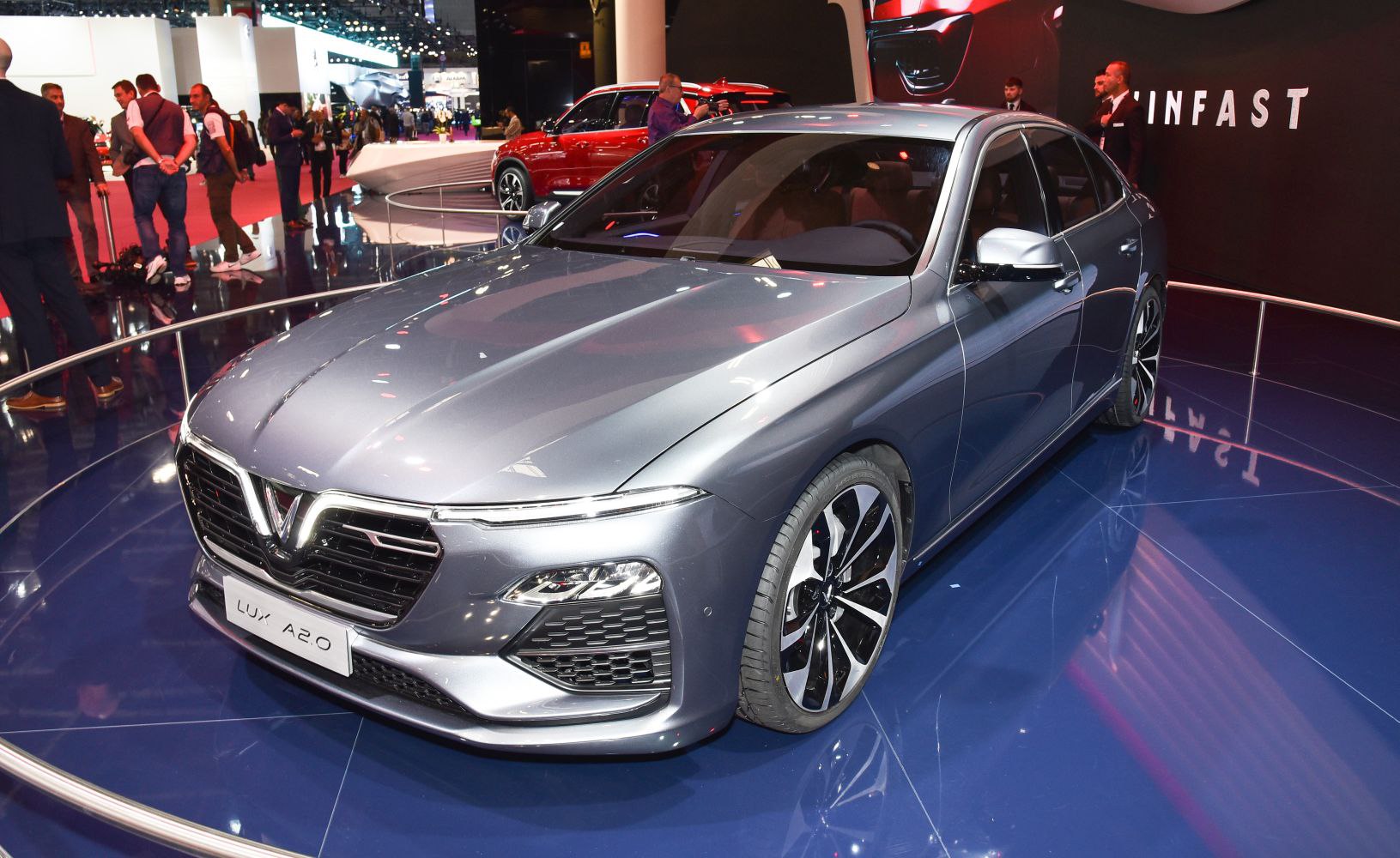 Front view focusing on black grille and LED headlights