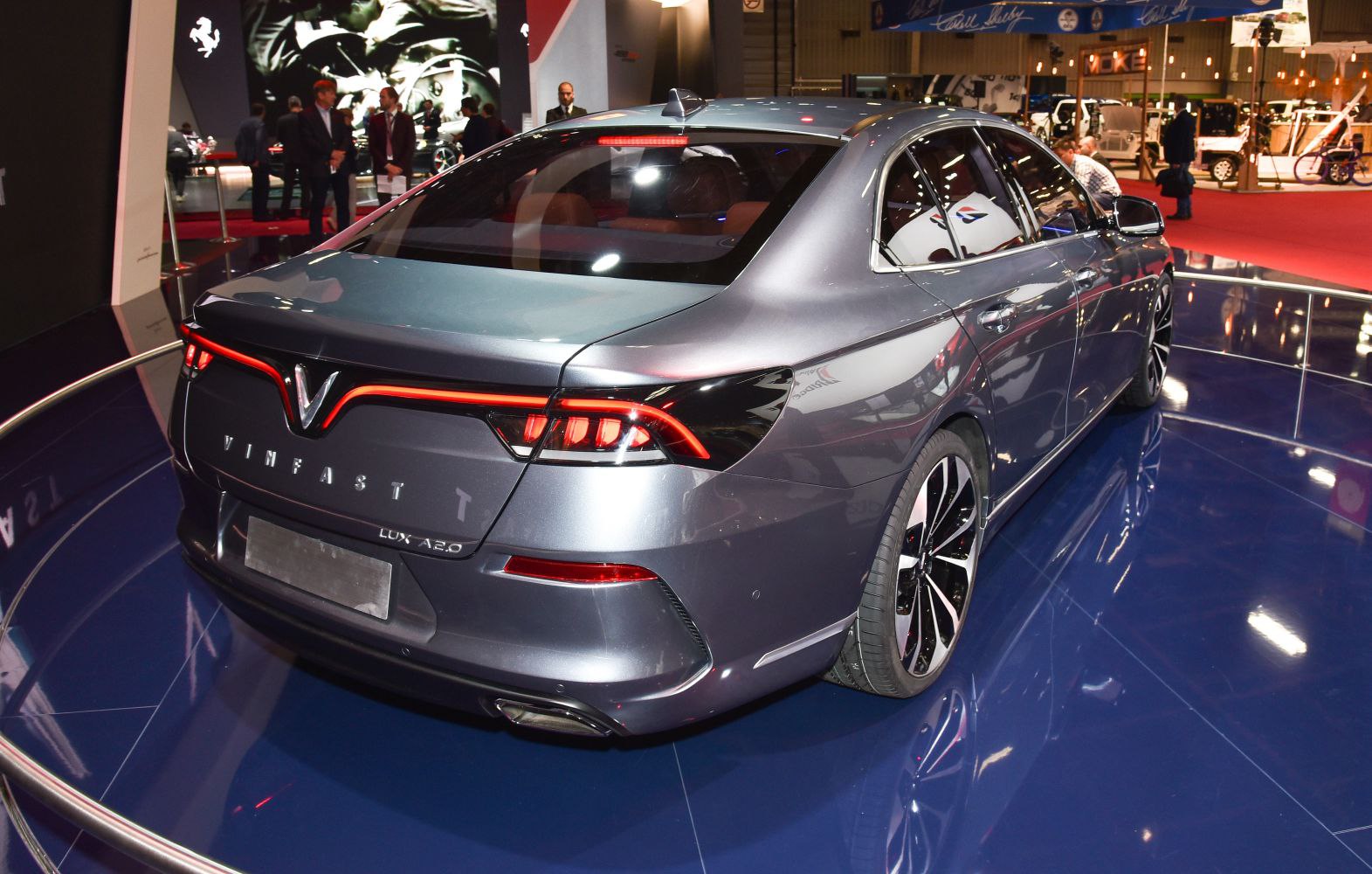 Rear and side of modern sedan with LED taillights and alloy wheels